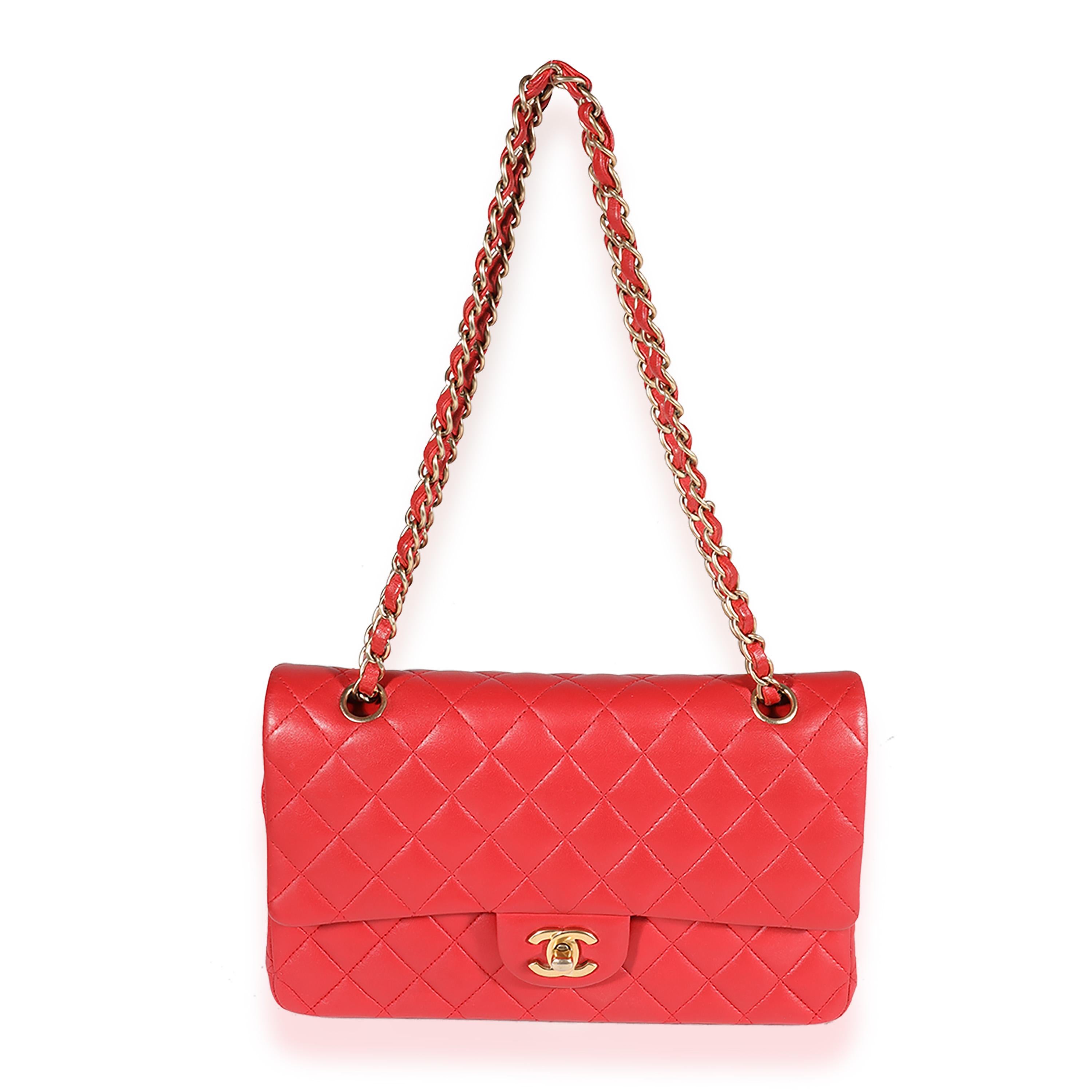 Listing Title: Chanel Red Quilted Lambskin Medium Classic Double Flap Bag
SKU: 123131
MSRP: 8800.00
Condition: Pre-owned 
Handbag Condition: Very Good
Condition Comments: Very Good Condition. Scuffing at corners and throughout exterior and