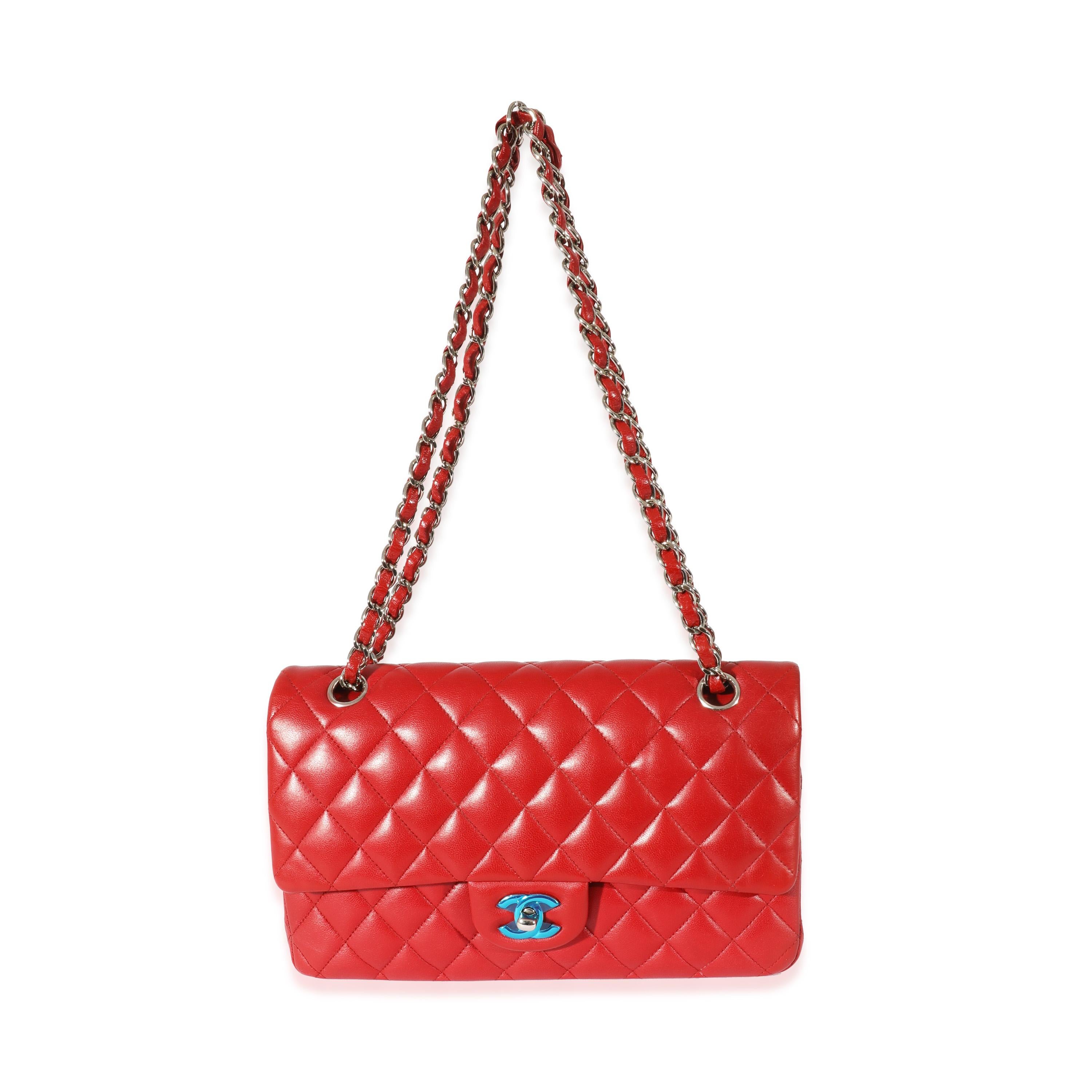 Listing Title: Chanel Red Quilted Lambskin Medium Classic Double Flap Bag
 SKU: 128365
 MSRP: 8800.00
 Condition: Pre-owned 
 Condition Description: A timeless classic that never goes out of style, the flap bag from Chanel dates back to 1955 and has