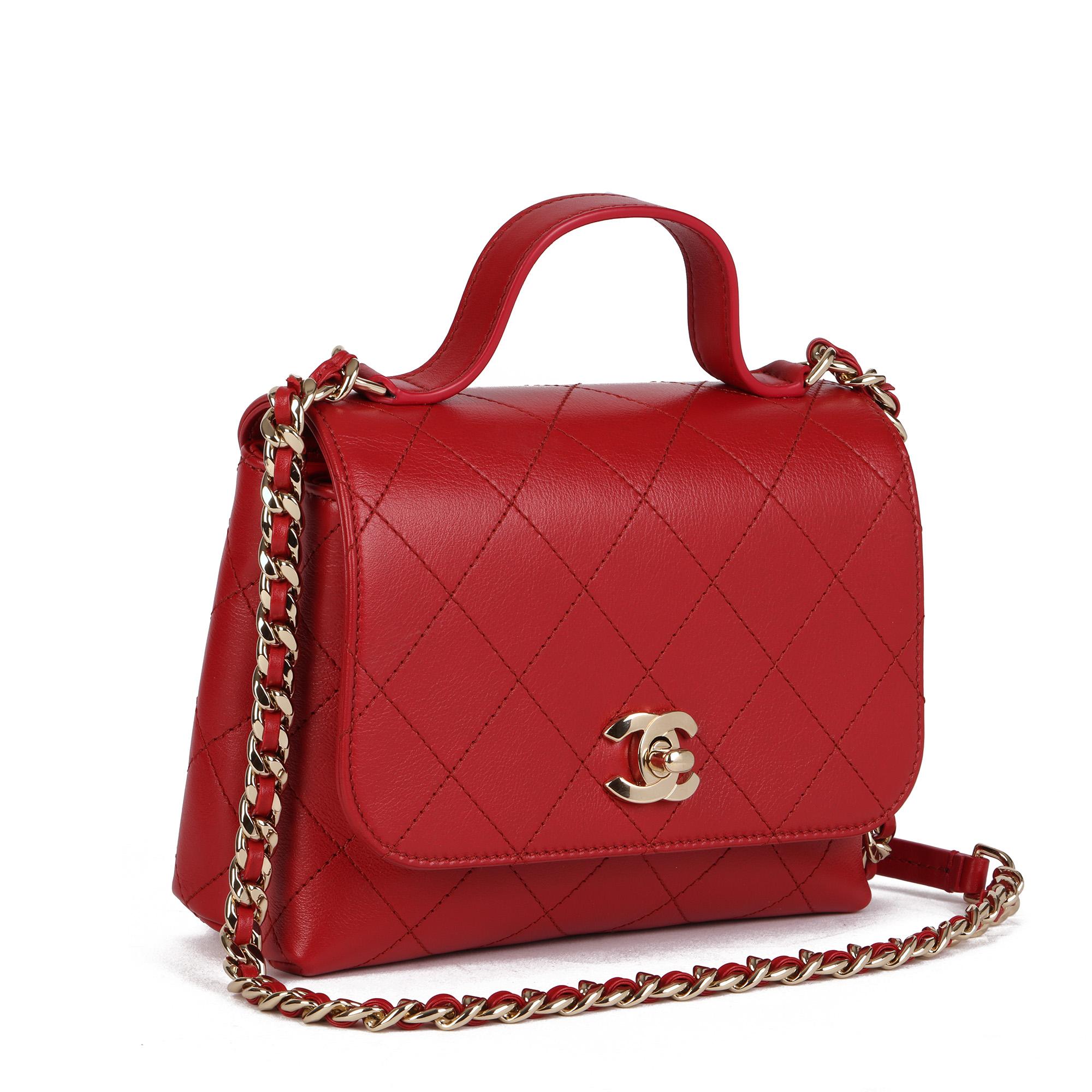 CHANEL
Red Quilted Lambskin Mini Classic Top Handle Flap Bag

Serial Number: 28420757
Age (Circa): 2021
Accompanied By: Chanel Dust Bag, Box, Care Booklet, Selfridges Receipt, Authenticity Card
Authenticity Details: Authenticity Card, Serial Sticker