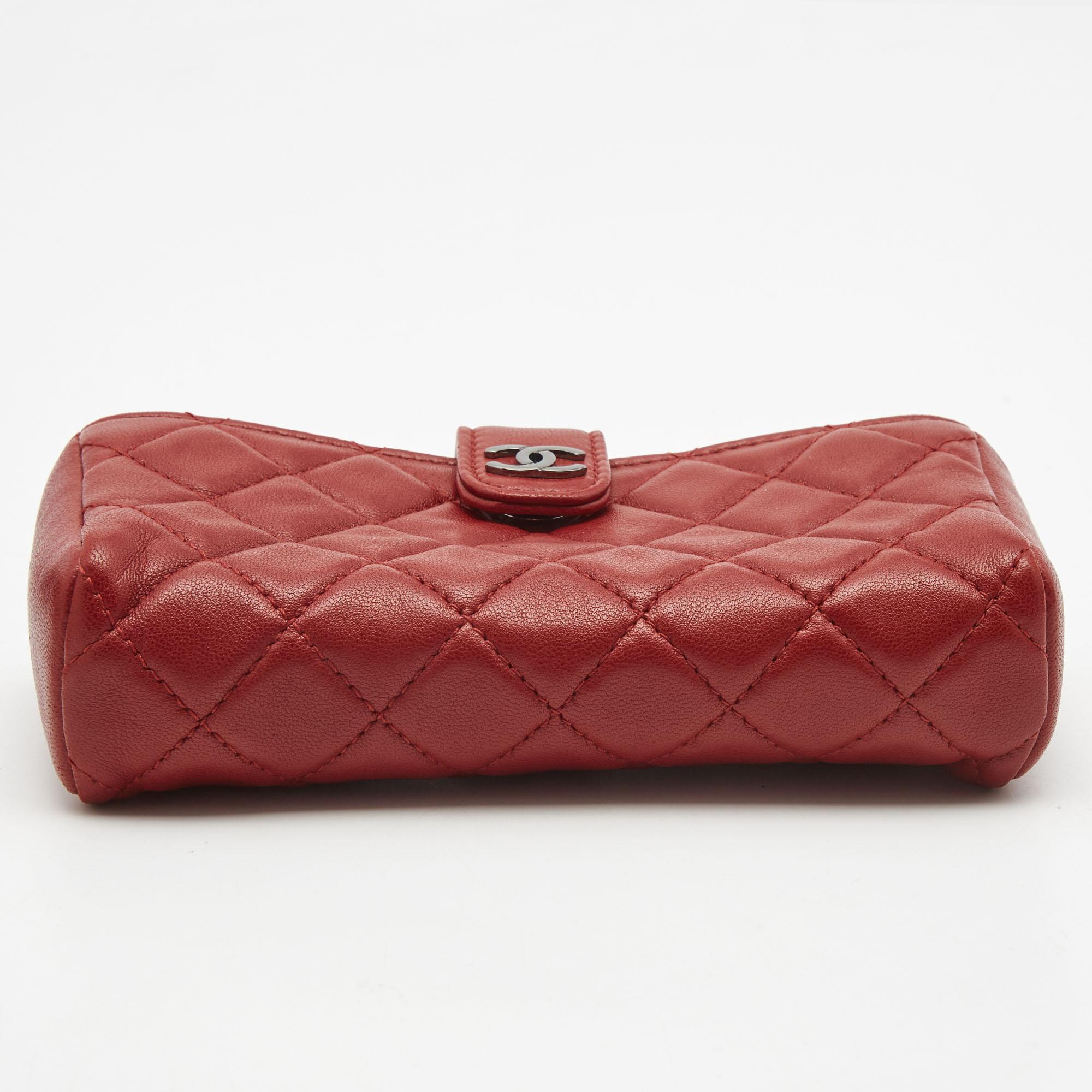 Why stop at owning a Chanel bag when you can also carry your phone in a lovely leather pouch with the brand's signature quilt? This creation from Chanel is one tech accessory you will love to flaunt. It has a CC-adorned flap that reveals a zip