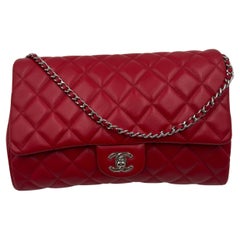 Chanel - Nouvelle pochette en cuir rouge matelassé 2013