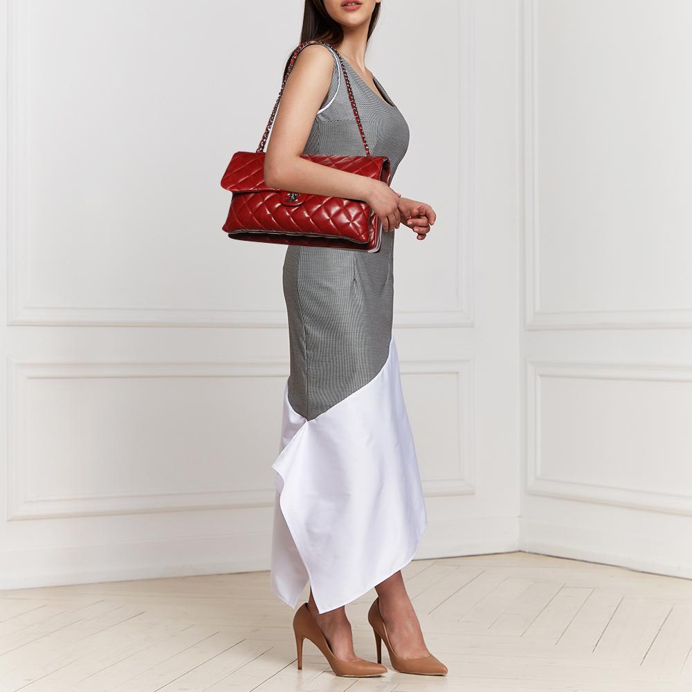 Chanel handbags are known for their unique designs that emanate the label's feminine verve and immaculate craftsmanship that makes their creations last season after season. The gorgeous piece comes in red quilted leather and has a shoulder strap.
