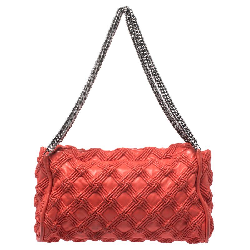 Chanel flap bags are coveted by women around the world. This 'Walk of Fame' bag is no different, rather it is one that is unique yet flaunts signature detailing synonymous with the brand/ Crafted meticulously in Italy, it is made from red leather.
