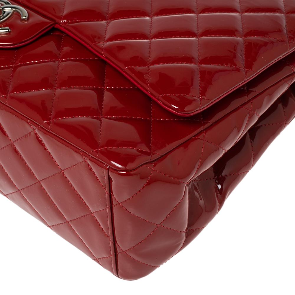 We're bringing Chanel's iconic Classic Flap bag to your closet with this beautiful creation. Exquisitely crafted from quilted patent leather, it bears the signature label inside the leather interior and the iconic CC turn-lock on the flap. The