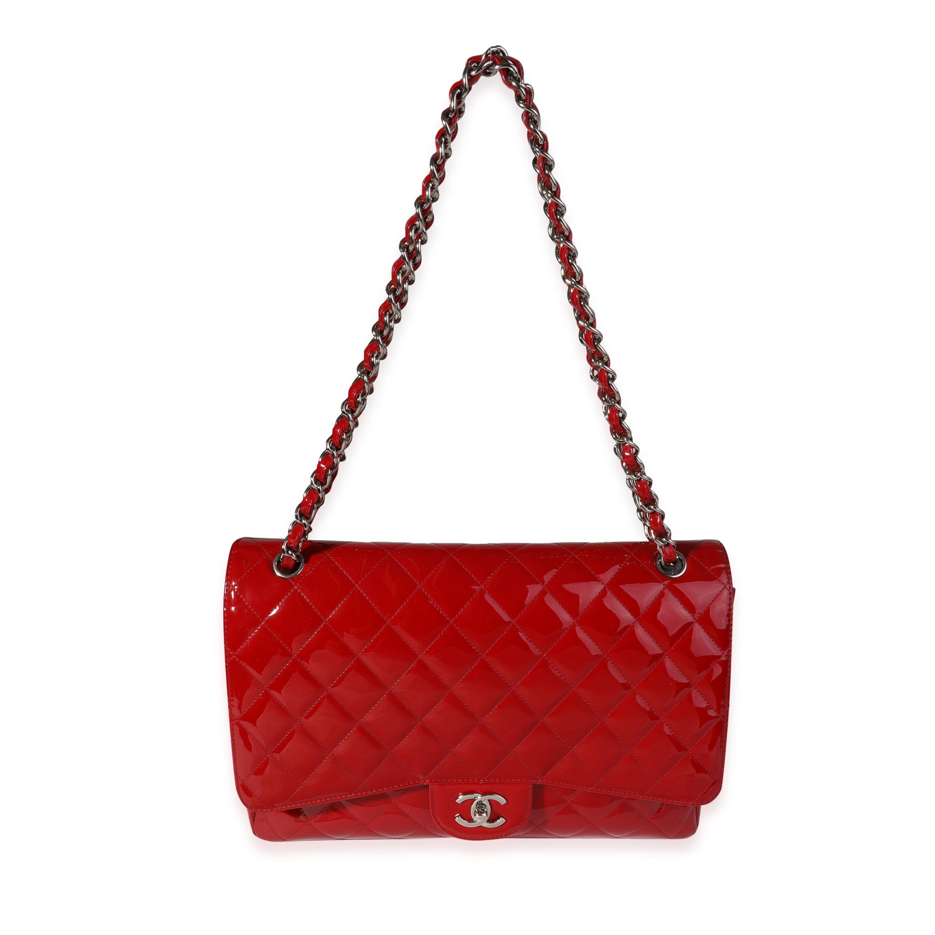 Listing Title: Chanel Red Quilted Patent Leather Maxi Classic Single Flap Bag
SKU: 121098
MSRP: 10000.00
Condition: Pre-owned 
Handbag Condition: Good
Condition Comments: Good Condition. Scuffing to corners. Scuffing and discoloration to patent.