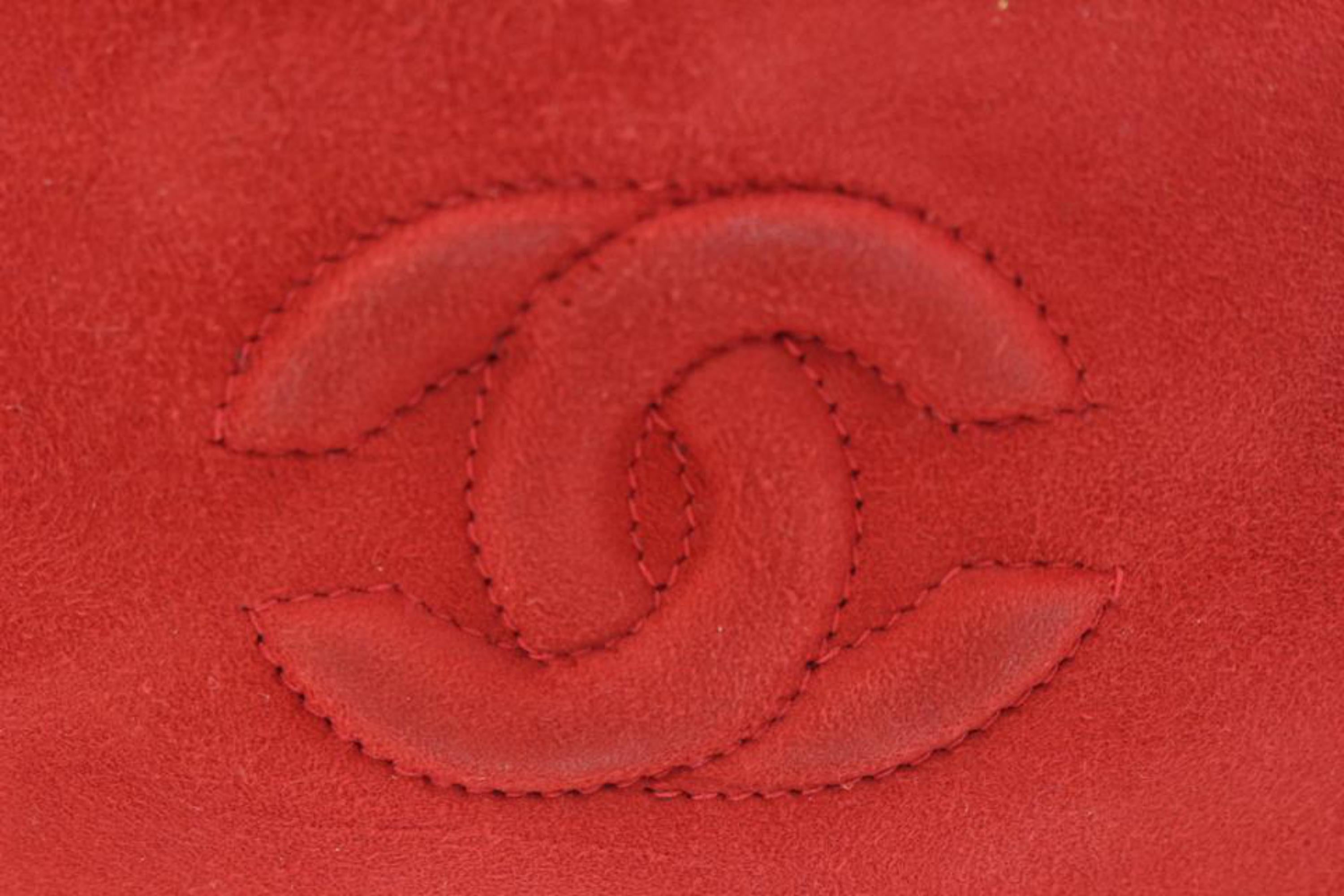Chanel Red Quilted Suede Mini Drawstring Crossbody Pouch Bucket Bag 28ck311s
Date Code/Serial Number: 0668435
Made In: Italy
Measurements: Length:  8