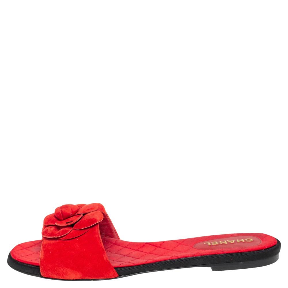 Wear these slides on days when you cannot choose between fashion and comfort for they bring both. They are from Chanel, designed with quilted satin insoles and a front suede strap embellished with the brand's signature Camellia flower.

Includes: