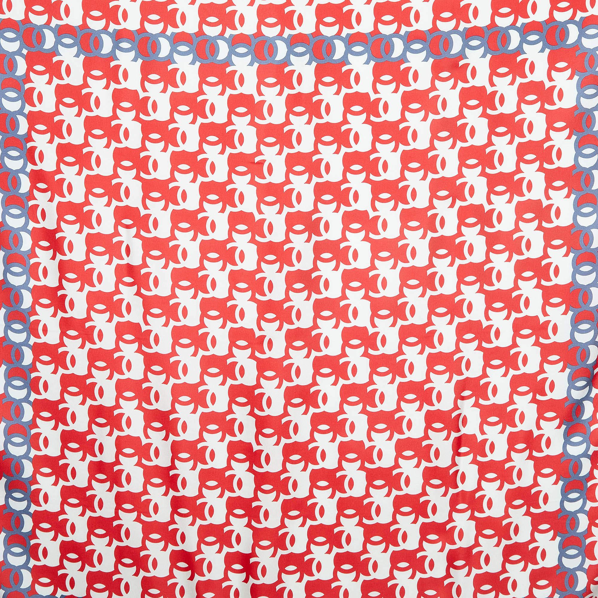 Elevate your style with this meticulously crafted Chanel scarf. Prints and timeless design unite for an exquisite accessory that exudes sophistication and style.