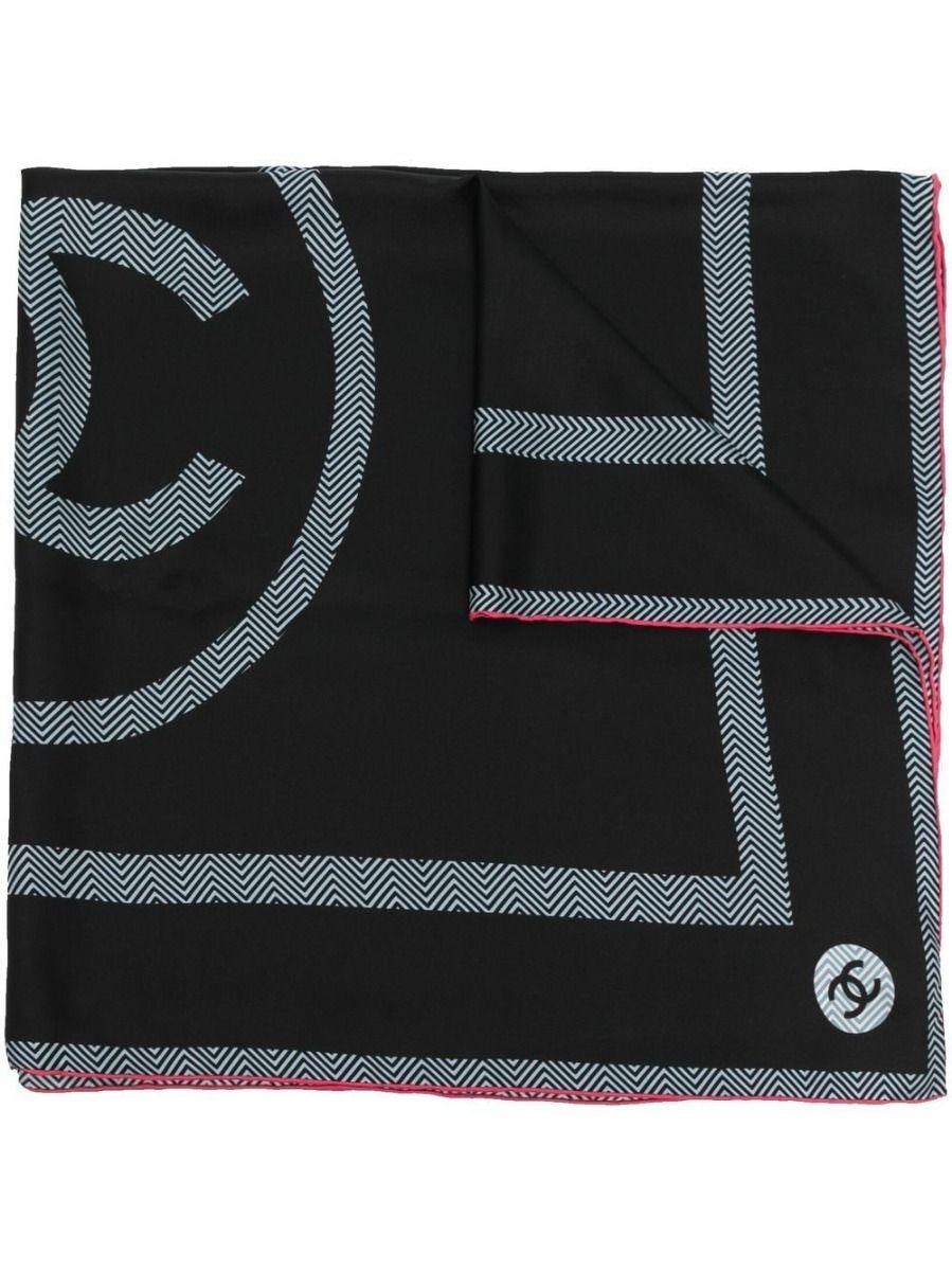 Printed with Chanel's signature CC logo in a wave pattern and finished with a red trim, this pre-owned Chanel scarf has been crafted from black silk. Designed in a square silhouette, it works just as well draped over the shoulders of a blazer as it