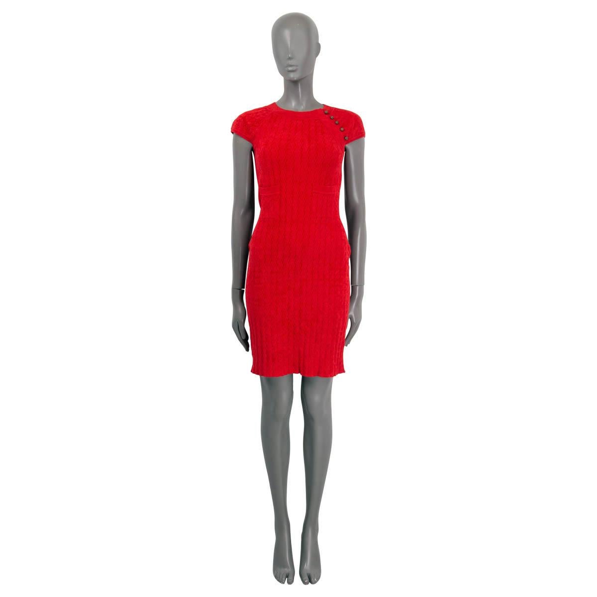 100% authentic Chanel cap sleeve rib knit dress in red viscose (63%) and polyamide (27%). Opens with five CC buttons at the neck. Has been worn and is in excellent condition.

2010 Paris-Shanghai Metiers d'Art

Measurements
Model	Chanel10A
Tag