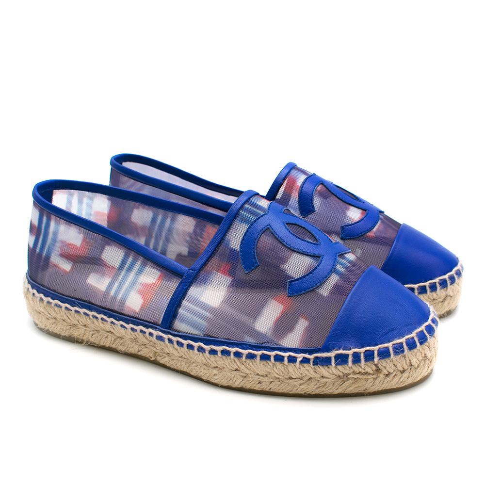 Chanel Red, White, and Blue Mesh Espadrilles

- Leather toe, lining, and Chanel logo
- Boosted twine platform
- Faint plaid pattern on mesh
- Leather insole

Please note, these items are pre-owned and may show signs of being stored even when unworn