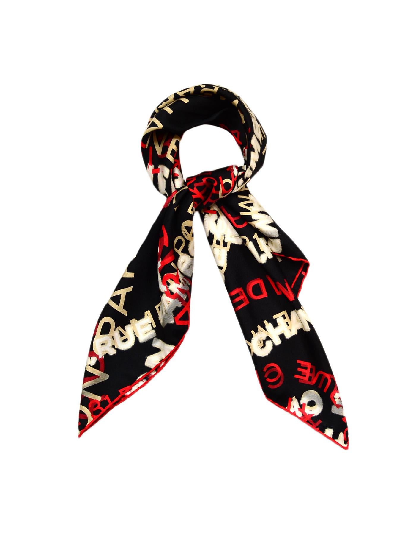 Chanel Red & White w/ Black Background Silk Scarf

Made In: Italy
Color: Red, White, Black
Materials: 100% Silk
Overall Condition: Excellent pre-owned condition

Measurements: 
34