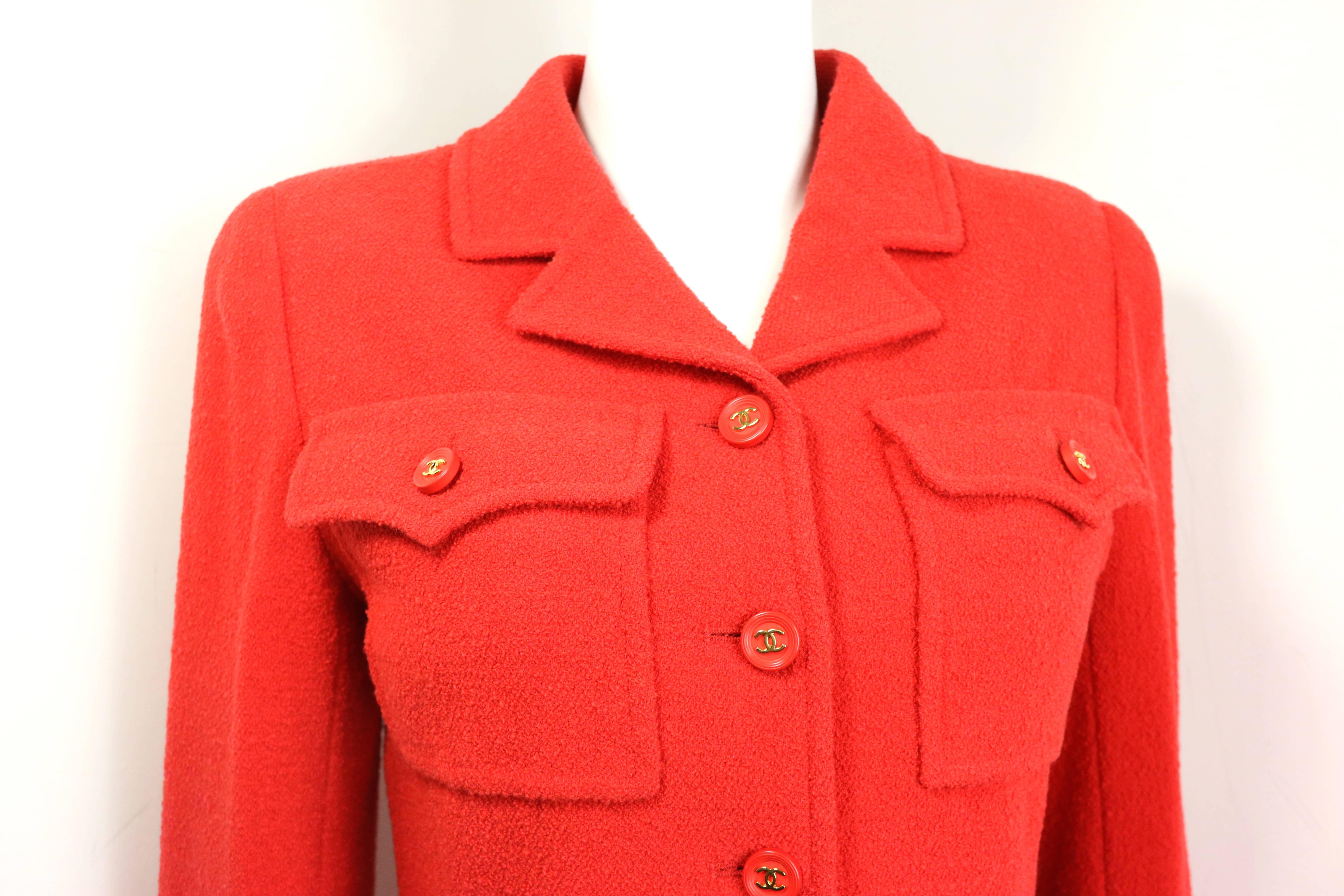 - Vintage Chanel red wool jacket from 1995 A/W collection. 

- Two front flap pockets with gold toned 