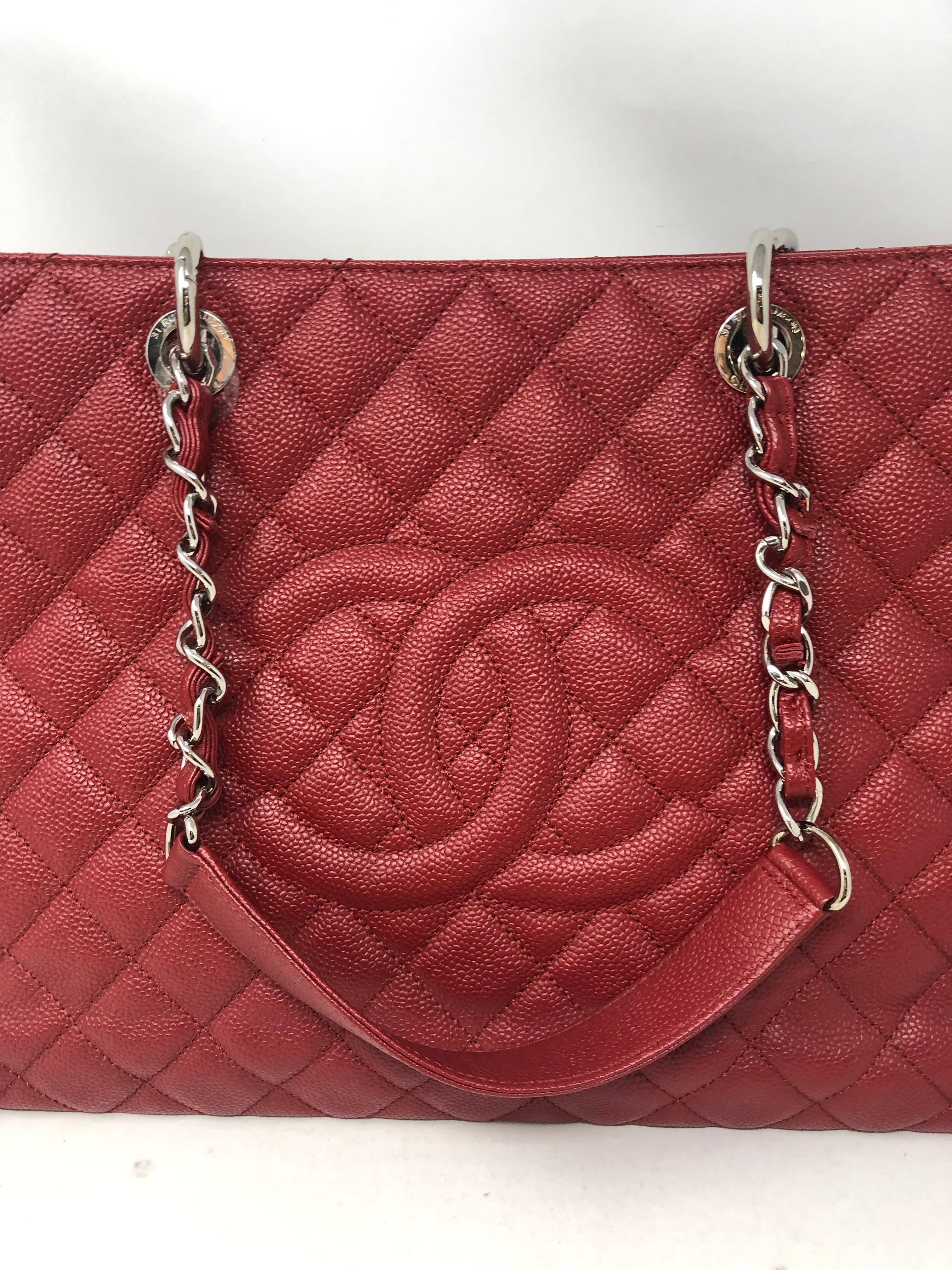 Chanel Red XL Grand Shopper Tote Bag. Caviar red leather with silver hardware. Mint condition. Plastic still on hardware. Beautiful bag that is retired from Chanel. Hard to find XL size. Guaranteed authentic. 