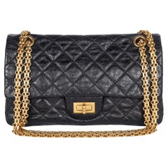 CHANEL Reissue 2.55 Sac à rabat en cuir de veau vieilli matelassé Noir