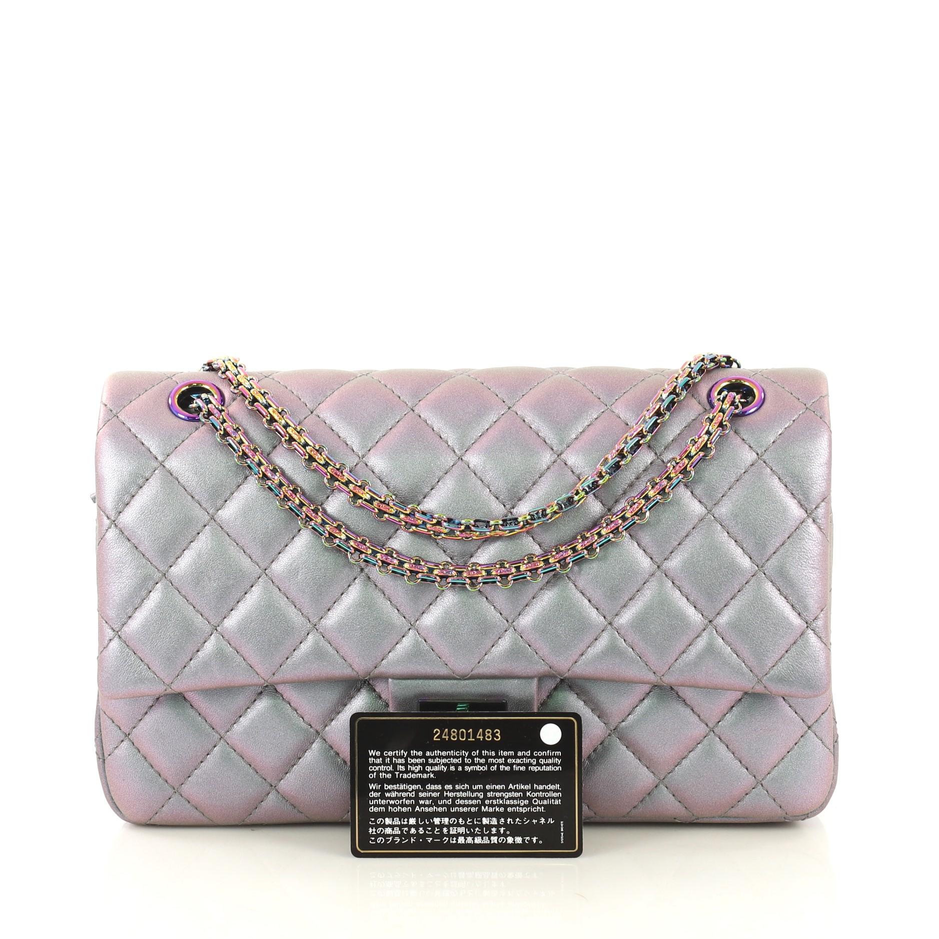 This Chanel Reissue 2.55 Flap Bag Quilted Iridescent Lambskin 226, crafted in purple quilted iridescent lambskin leather, features reissue chain strap, front flap and iridescent tone hardware. Its mademoiselle turn-lock closure opens to a purple