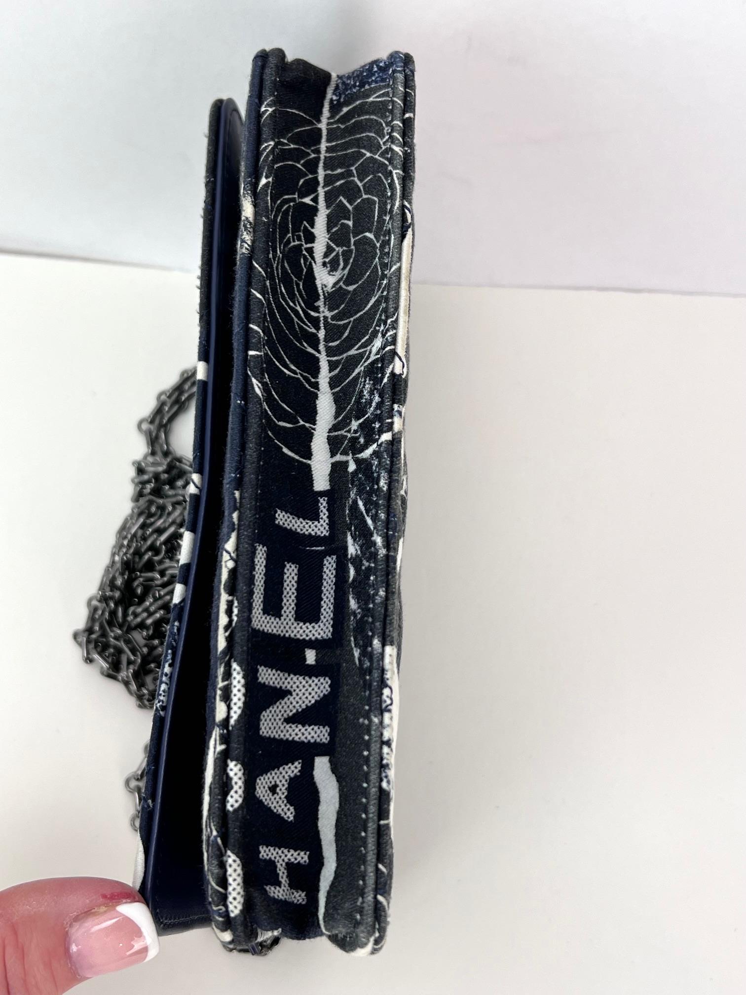 Pre-Owned  100% Authentic
Chanel Reissue 2.55 Quilted Printed Canvas Limited Edition Wallet on a Chain Clutch RARE
Wallet on a Chain or Clutch
A I Phone Max fits in bag easily. 
RATING: AB   very good, well maintained, shows minor signs of wear