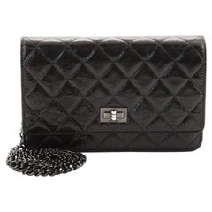 Chanel Reissue 2.55 Portemonnaie an Kette Gesteppt Gealtertes Kalbleder Chanel Reissue 2.55 Portemonnaie an Kette Gesteppt Gealtertes Kalbleder
