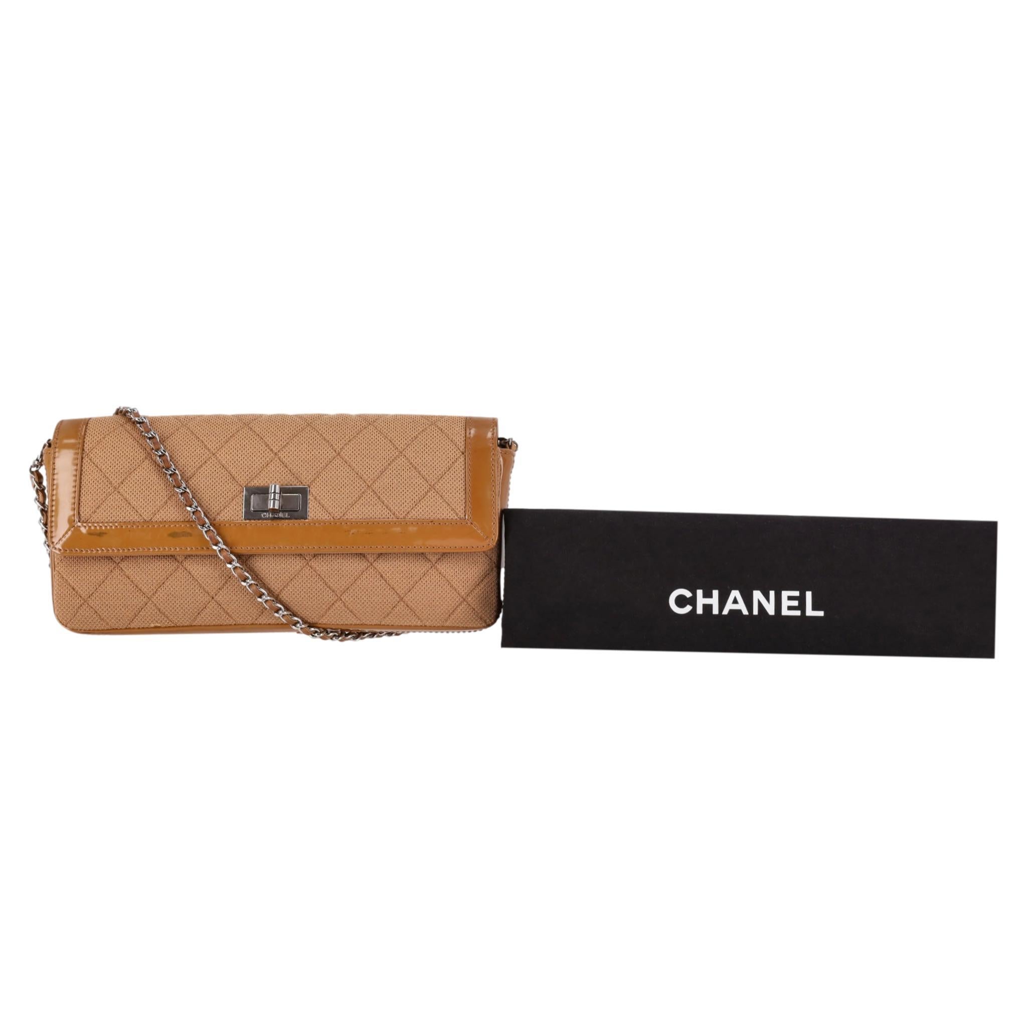  Chanel Reissue East West Jersey & Patent Leather Shoulder Bag

Dark beige bag crafted from diamond quilted jersey with patent leather trim.

Featuring signature leather and chain shoulder strap and front flap with 'Chanel' engraved Mademoiselle