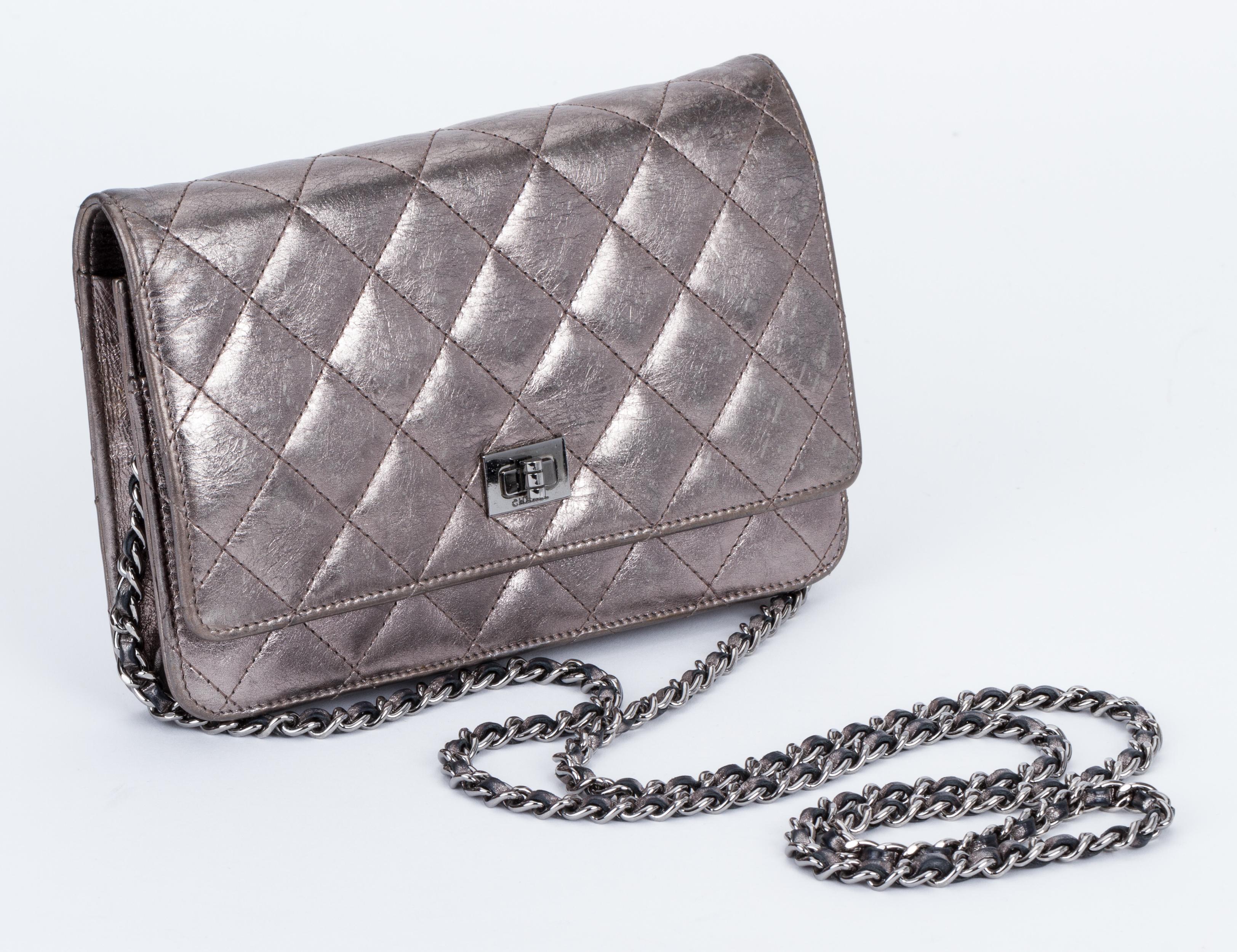 Chanel reissue quilted pewter leather cross body wallet on a chain. Shoulder drop 25