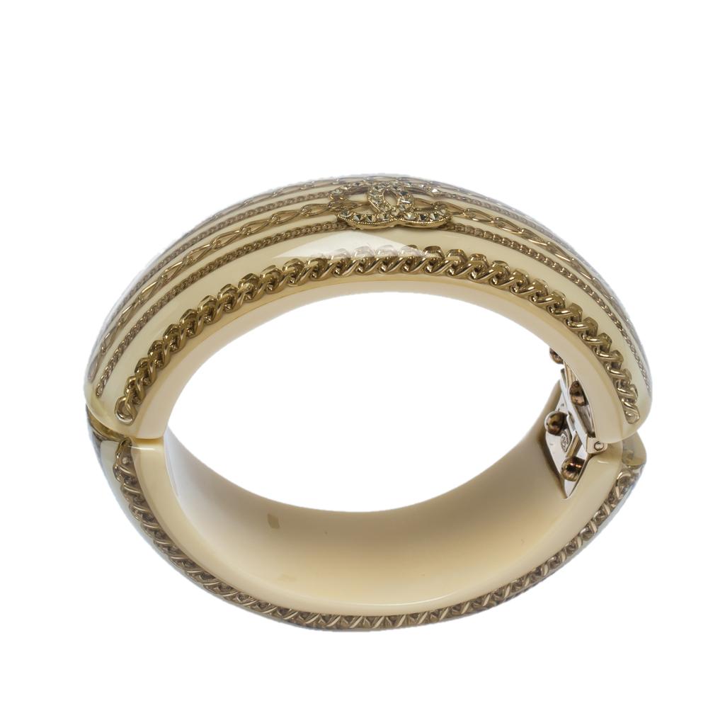 Contemporary Chanel Resin & Crystal CC Gold Tone Oval Bangle