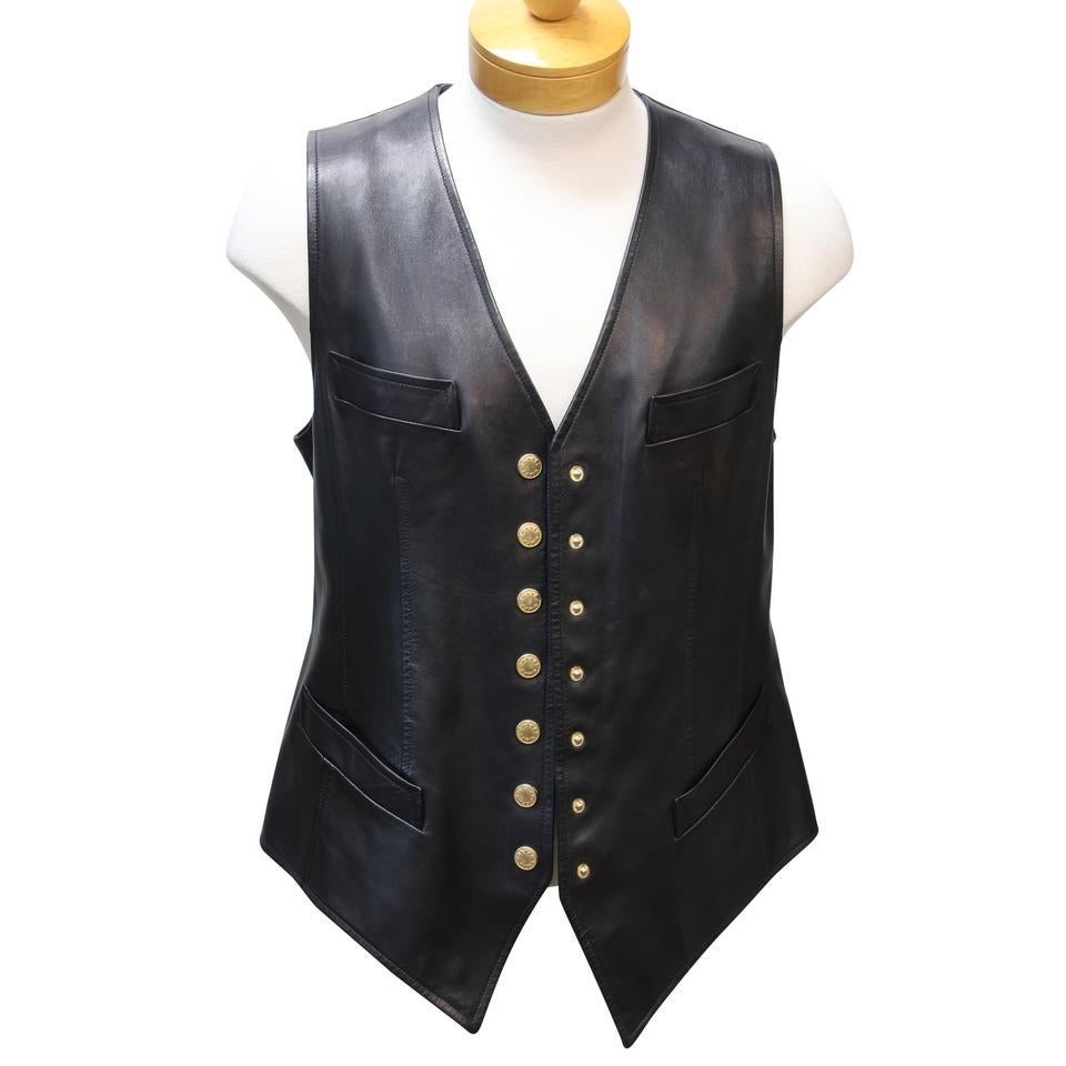 Chanel Retro 90's Classic Sleeveless CC Lambskin Gold Button Leather Vest SZ 50

Descriotion:
This sleeveless retro vest features a v-neckline, a silk lining, a high low hemline and straight fit. Made in France from black lambskin leather, it