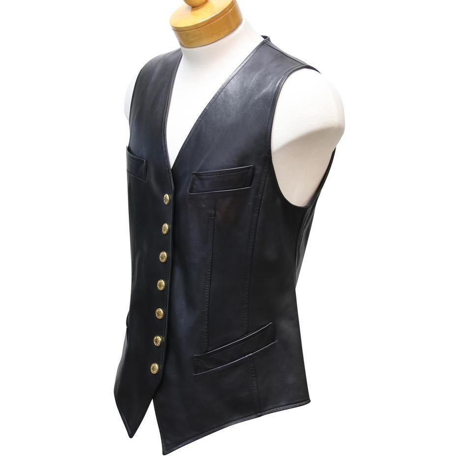 black vest with gold buttons