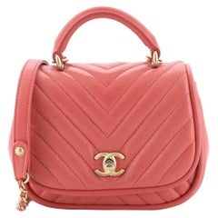 Chanel Reversed Round Flap Bag Chevron Lambskin Mini 