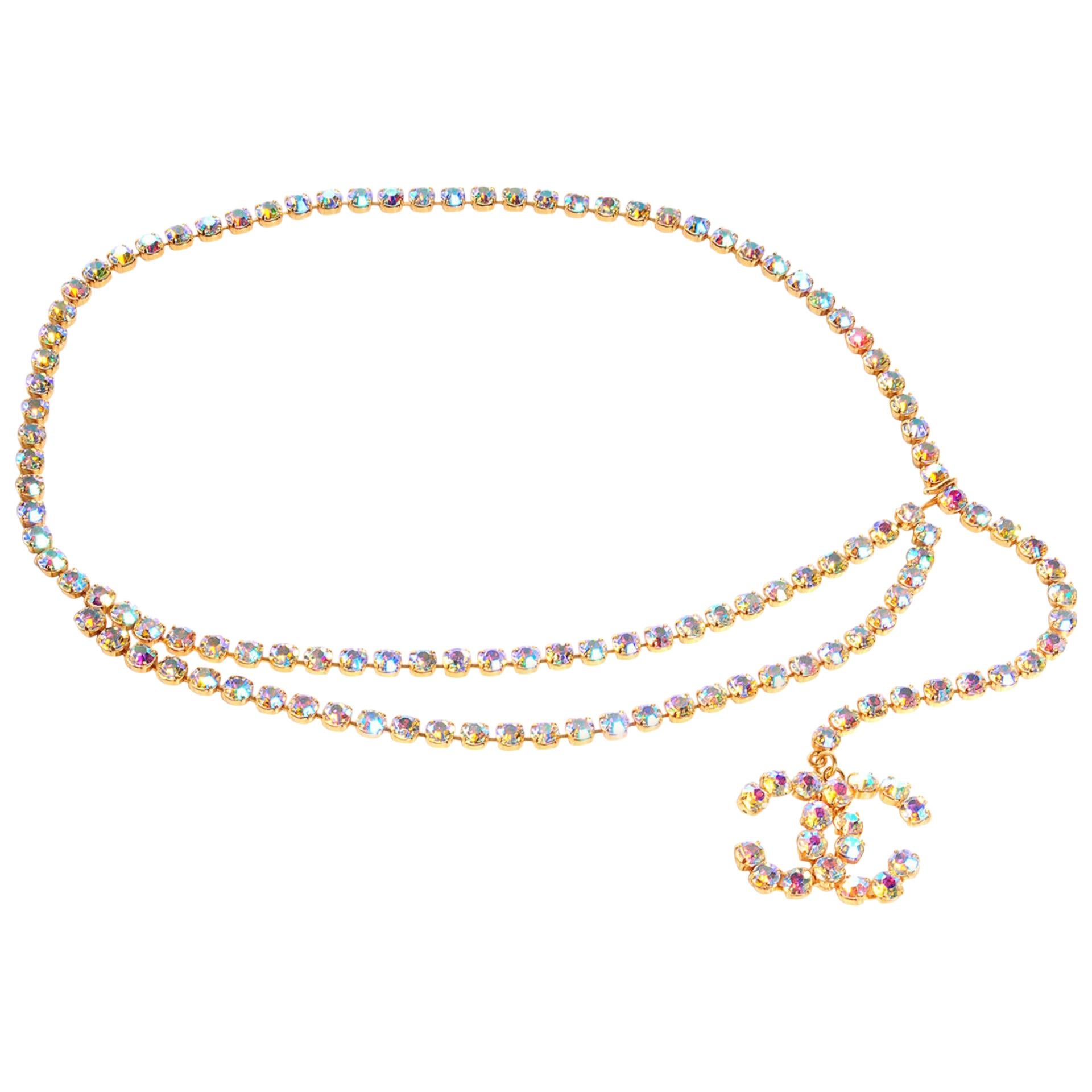 Chanel 1995 Spring Runway Rhinestone Double Strand CC Diamond Barbie Belt

This stunning belt is a creation of small gold link settings each securing a rhinestone with a prism of color. The front of the belt features a double drape and the