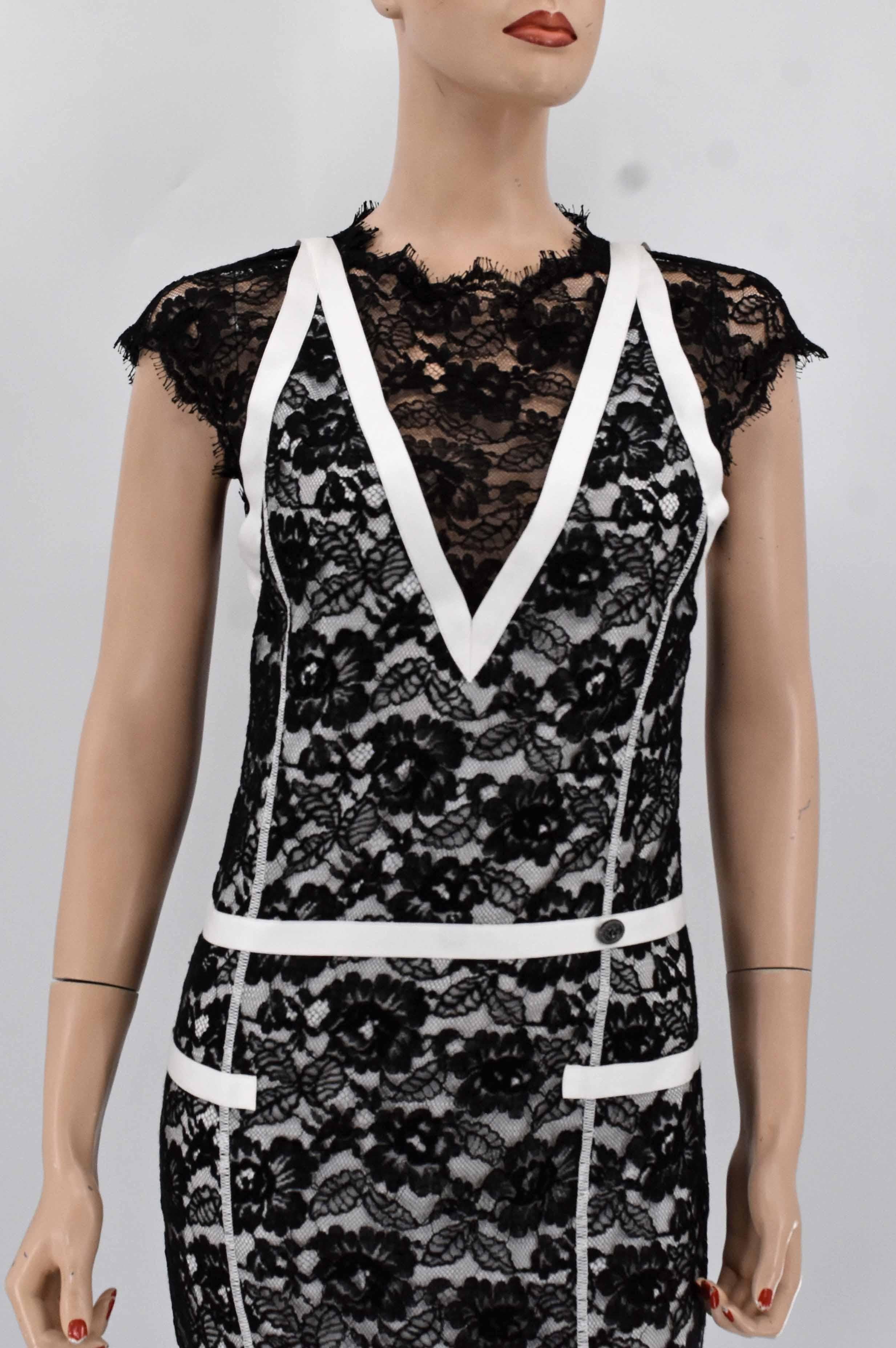 Chanel ribbon embellished runway maxi dress from Chanel Cruise 2014 runway collection. It is adorned with Chanel interlocking CC logo emblem. It is new with tag, retails $7,750. 
