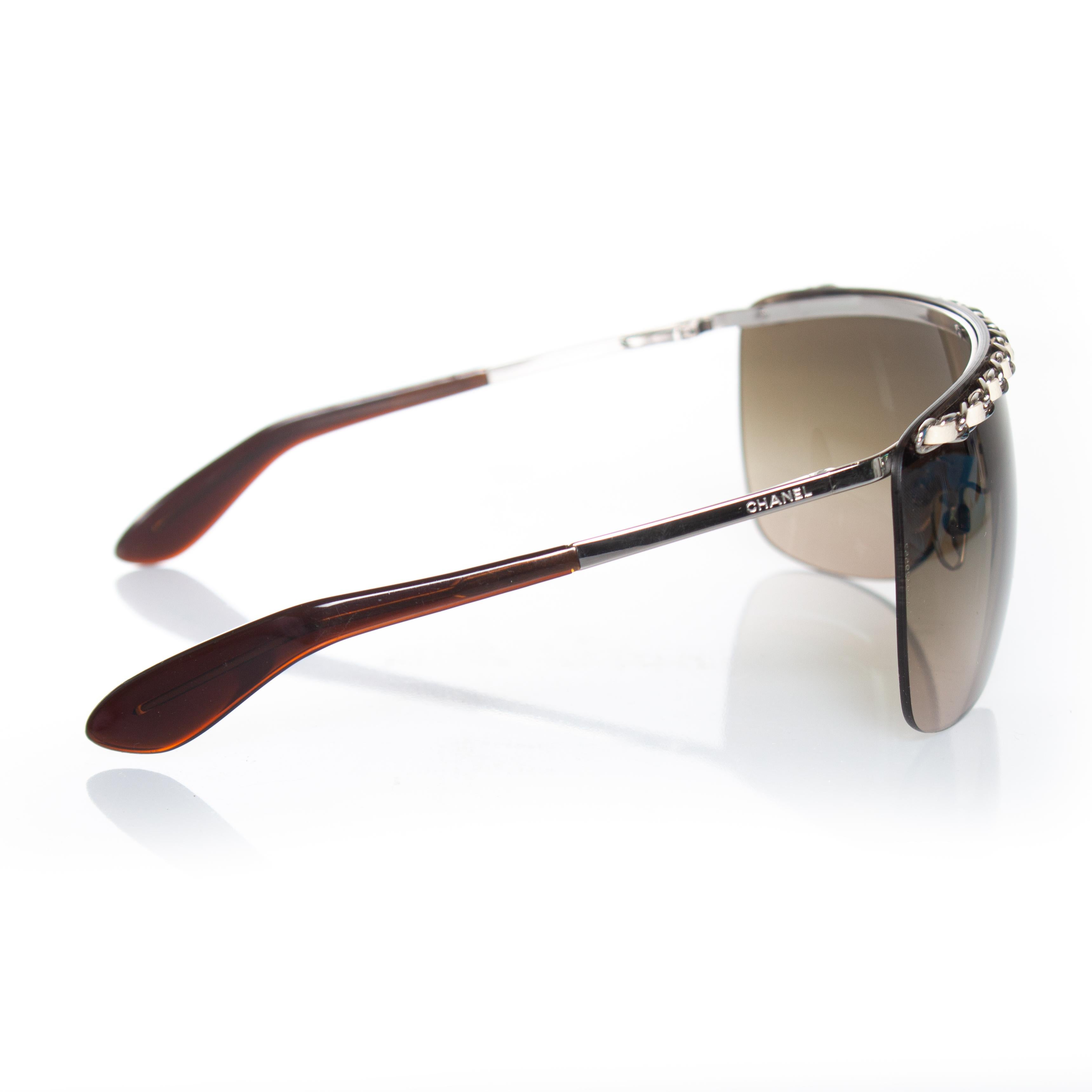 Brown Chanel, rimless shield chain sunglasses For Sale