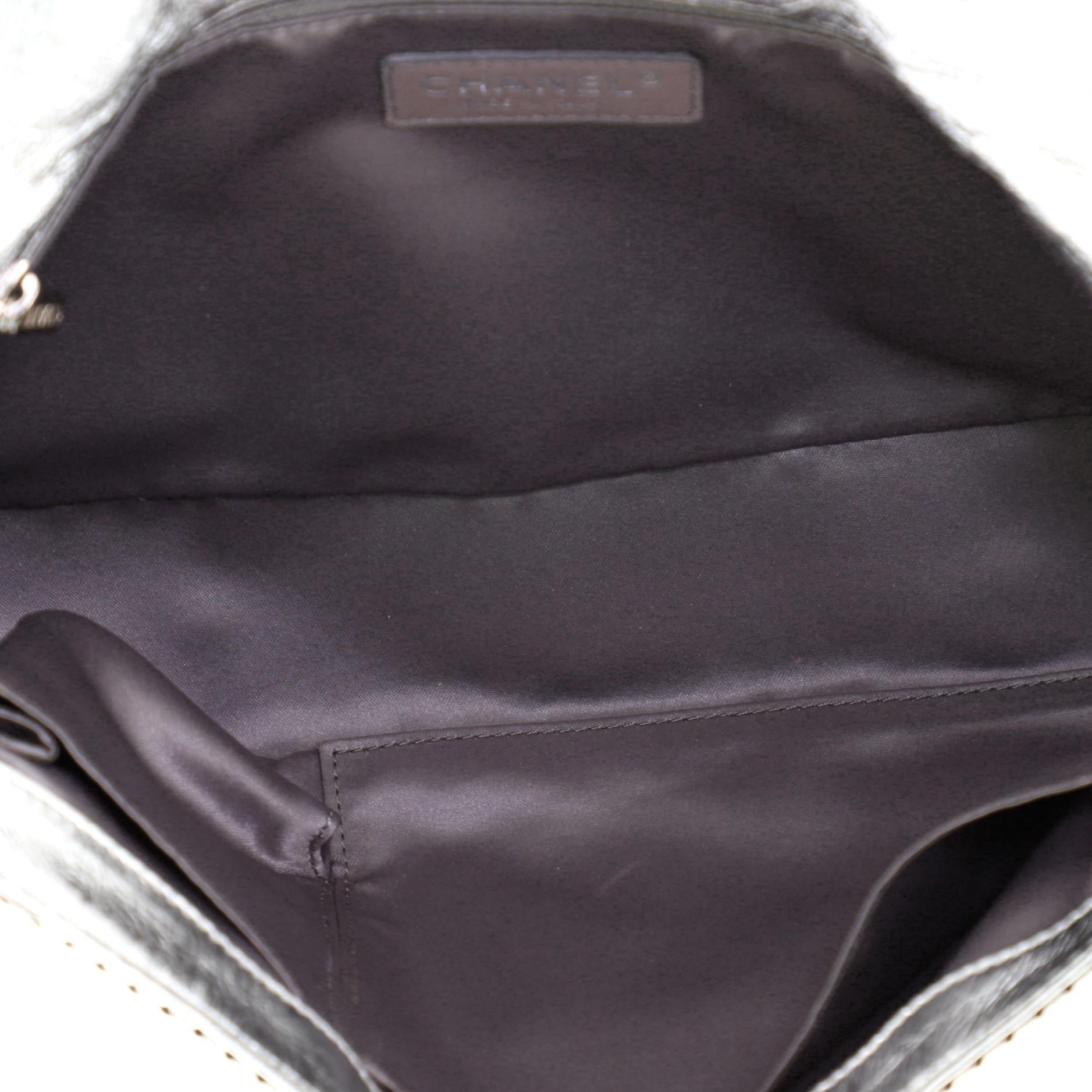 Chanel Rodeo Drive Flap Bag Perforated Leather Medium In Good Condition In NY, NY