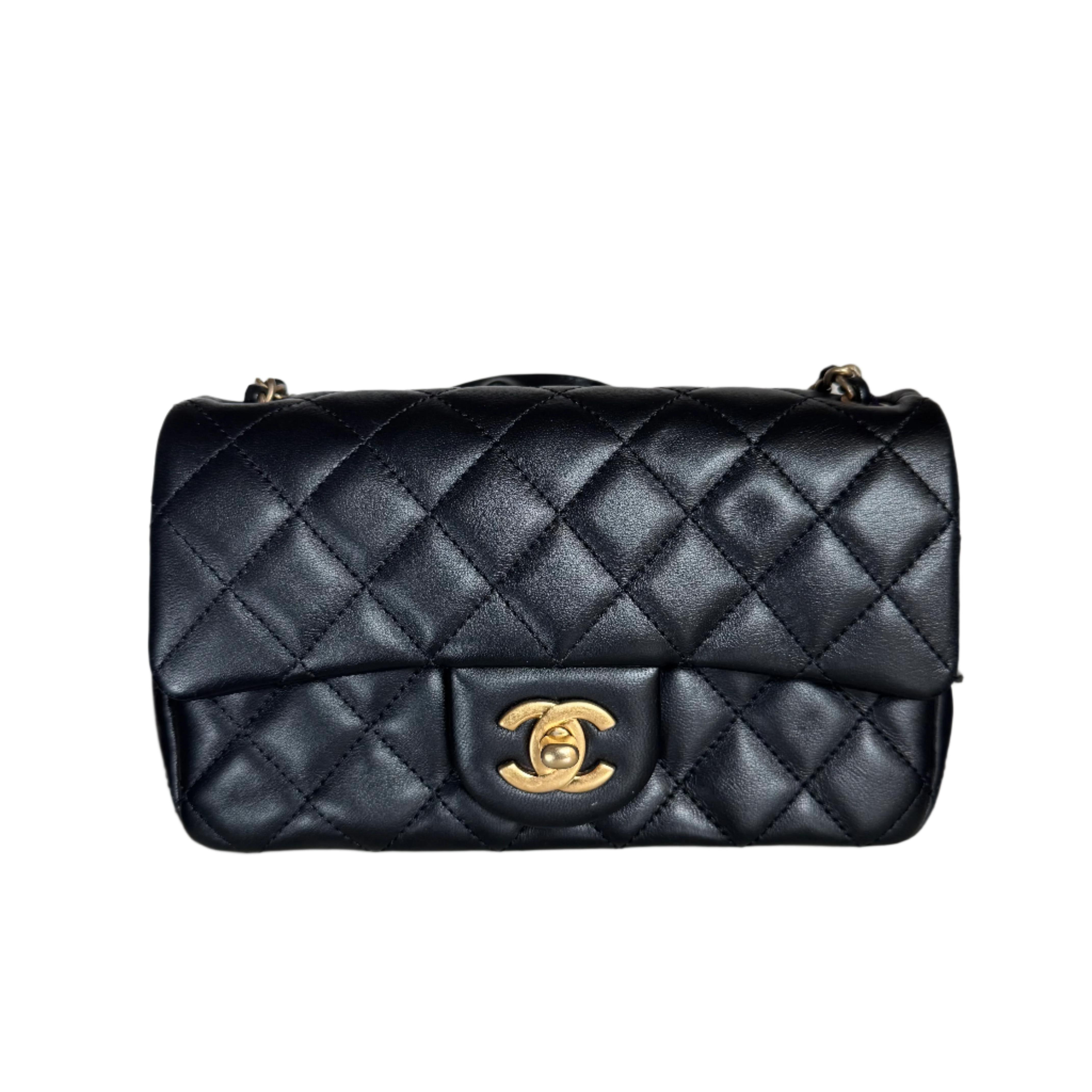 CONDITION: VERY GOOD ORIGINAL CONDITION

This previously owned/ used authentic Chanel CF mini is in excellent condition with light signs of use. The leather is buttery soft as it's in its original condition. Light rubbing around the corners, and