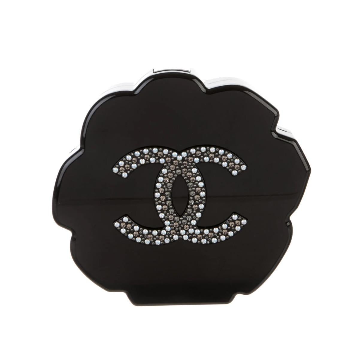 For Serious Chanel Collectors Only.

Combining a sturdy black resin base with intricate Strass crystal, this beautifully maintained Chanel evening bag is a beautiful sight to behold. Featuring pink gradient Strass crystals and silver tone hardware,