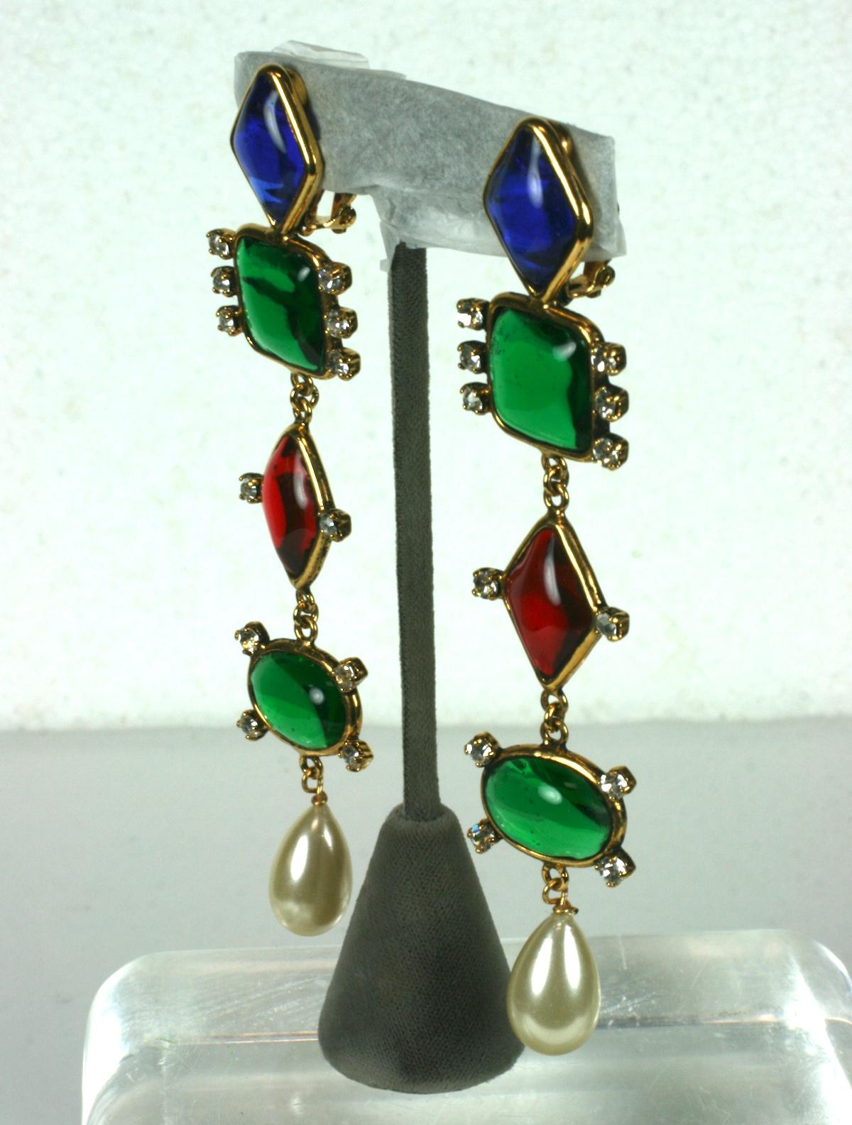 Amazing long Chanel Runway Earrings, Maison Gripoix. Completely handmade bezels with signature ruby, emerald and sapphire poured glass accented with pastes accented with a handmade poured glass pearl.
Unsigned as is common with extravagant Runway or
