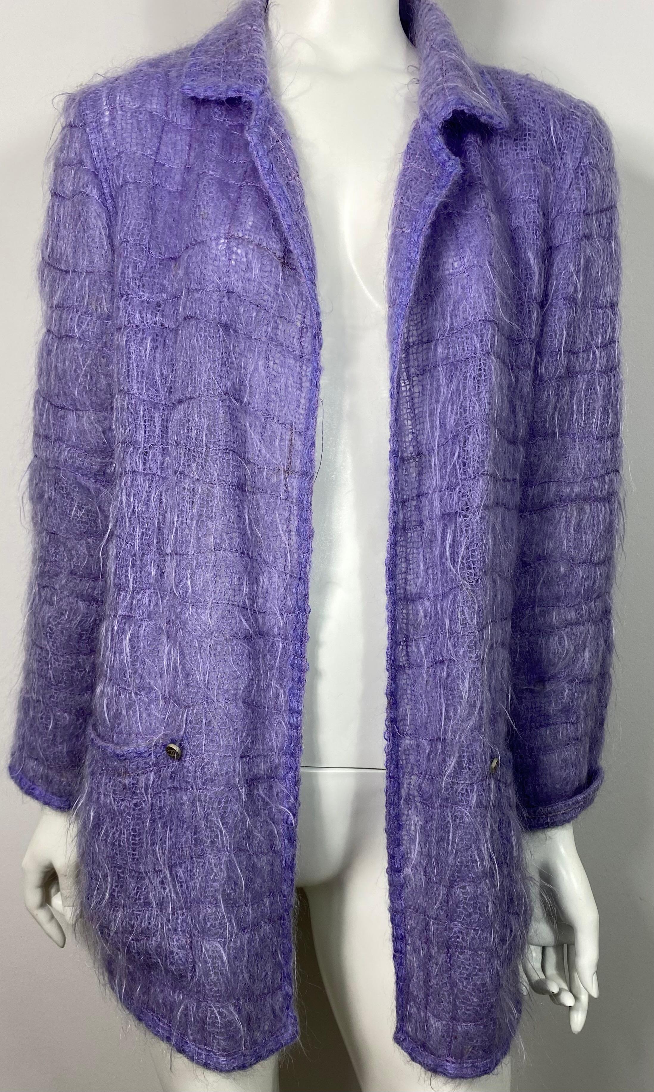 Chanel Runway Fall 1998 Lavender Mohair Jacket - Size 36. This Karl Lagerfeld 1990’s Runway piece was part of the Fall 1998 Collection. The jacket is very lightweight and made of a lavender Mohair (62%) and Wool (38%) blend fabric. The unlined