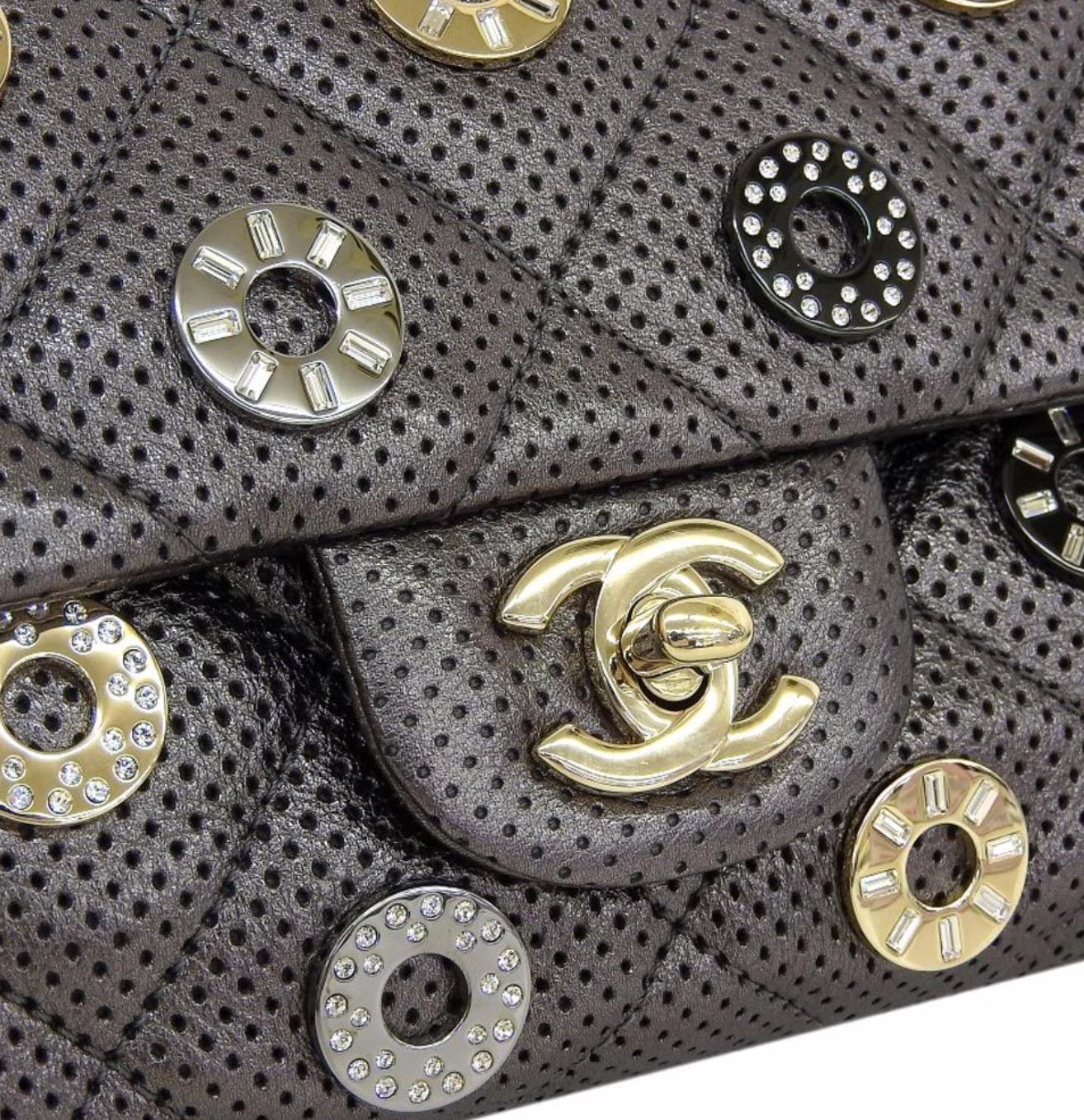 Leather
Gold tone hardware
Rhinestone 
Woven lining
Turnlock closure
Made in Italy
Shoulder strap drop 23