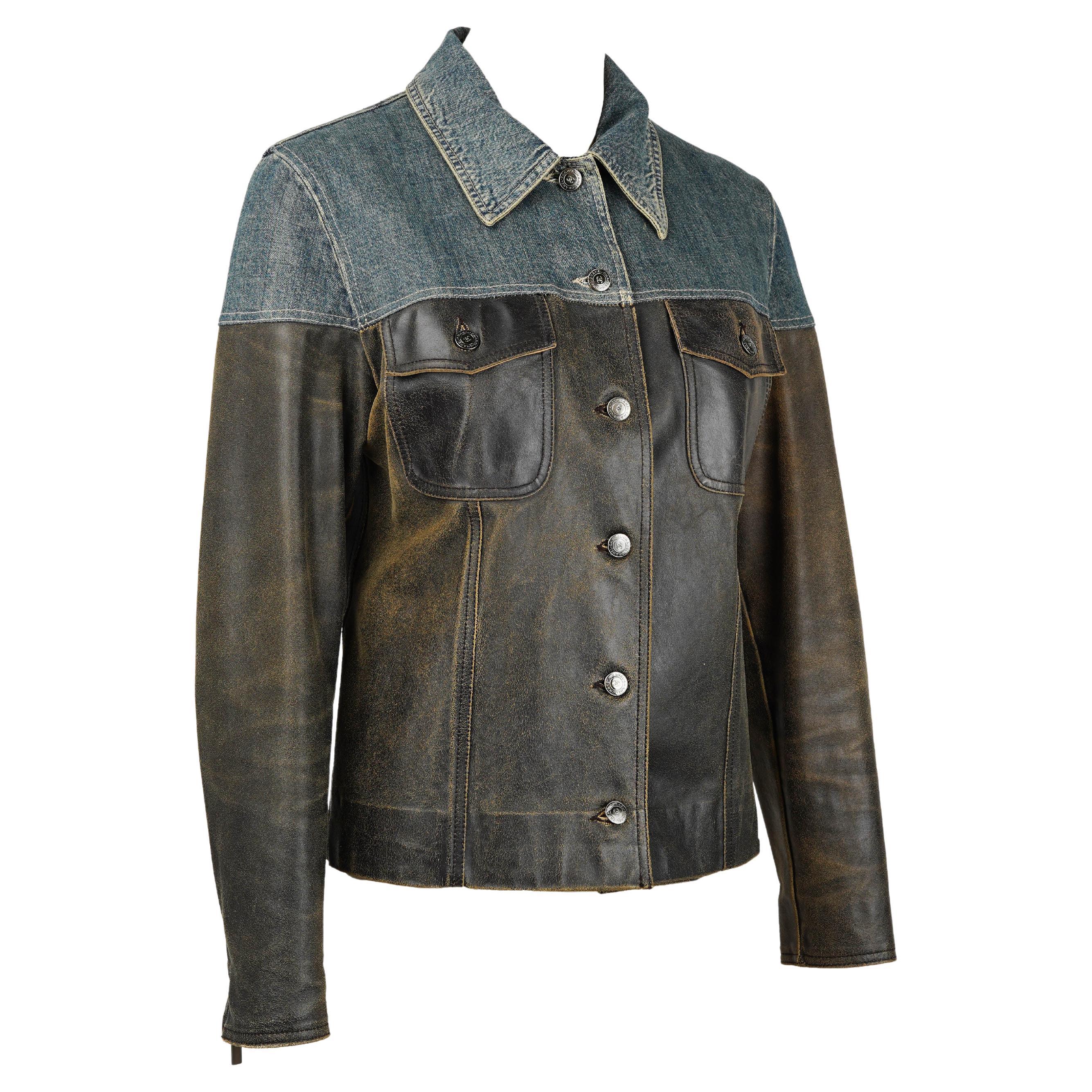 A rare and highly collectible piece from Chanel’s Fall/Winter 2000 runway, this mixed-media jacket exemplifies Karl Lagerfeld’s turn-of-the-millennium experimentation with texture, streetwear elements, and elevated grunge influences. Look 38, worn