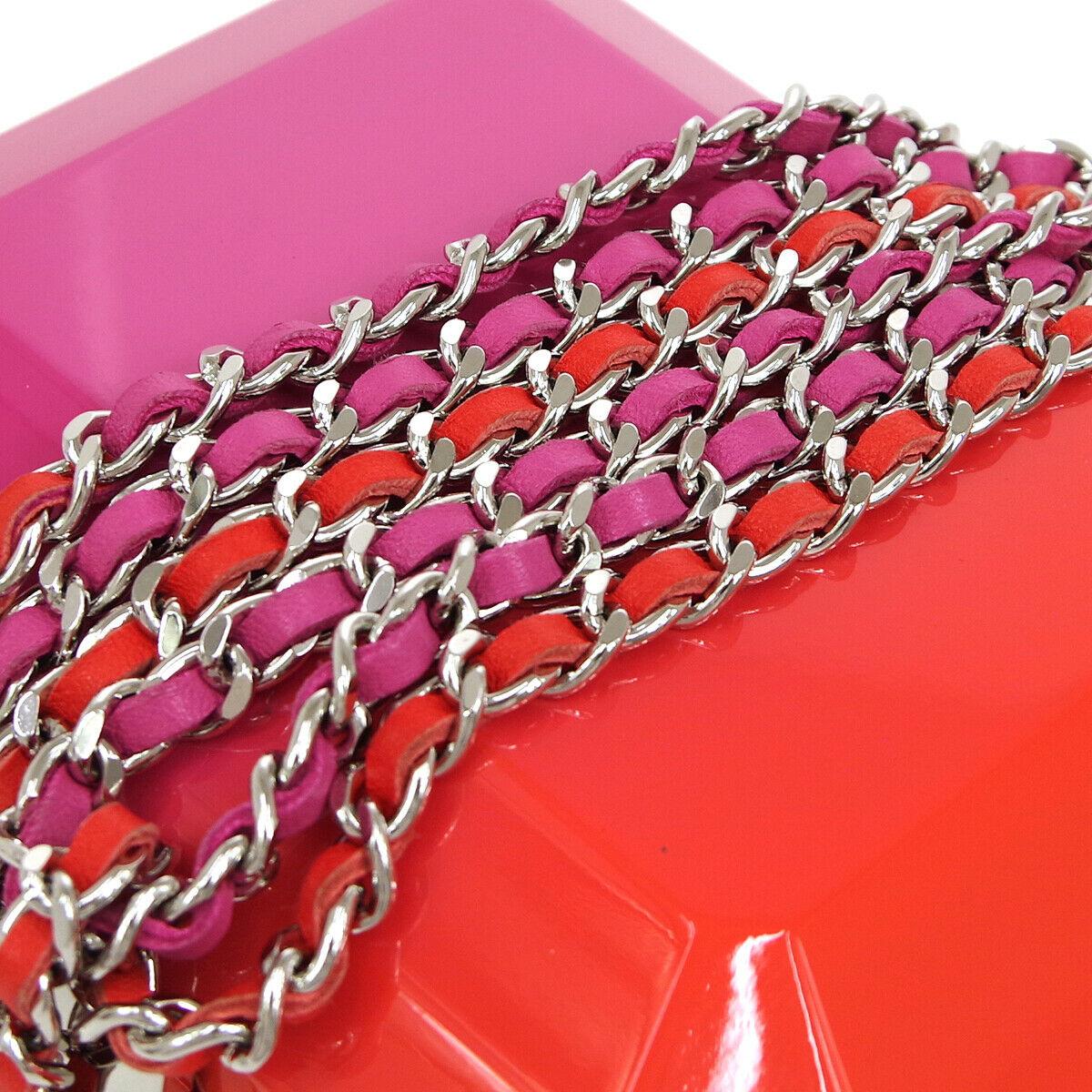 pink and orange clutch bag