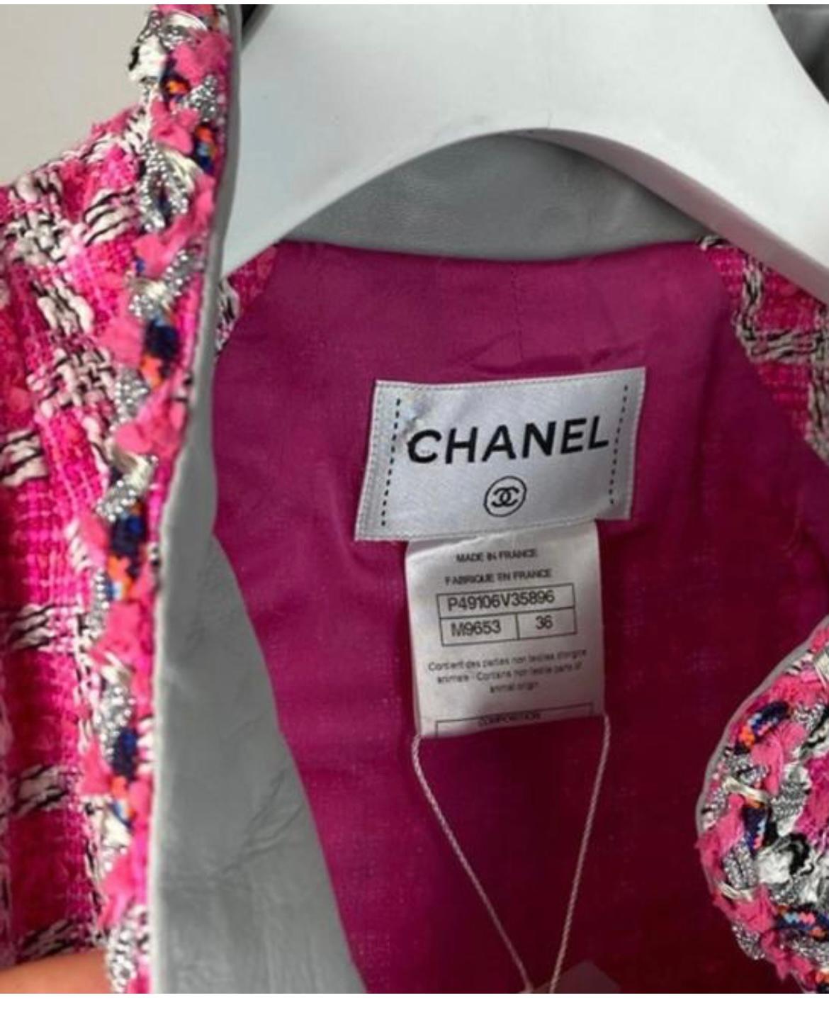 CHANEL S/S 2014 RUNWAY EMBELLISHED TWEED MINI DRESS SIZE FR 36 US 4 RETAIL $6,350. Runway statement dress in pink tweed. 

Dress has been altered at the chest area, and it fits a smaller size, 34. 