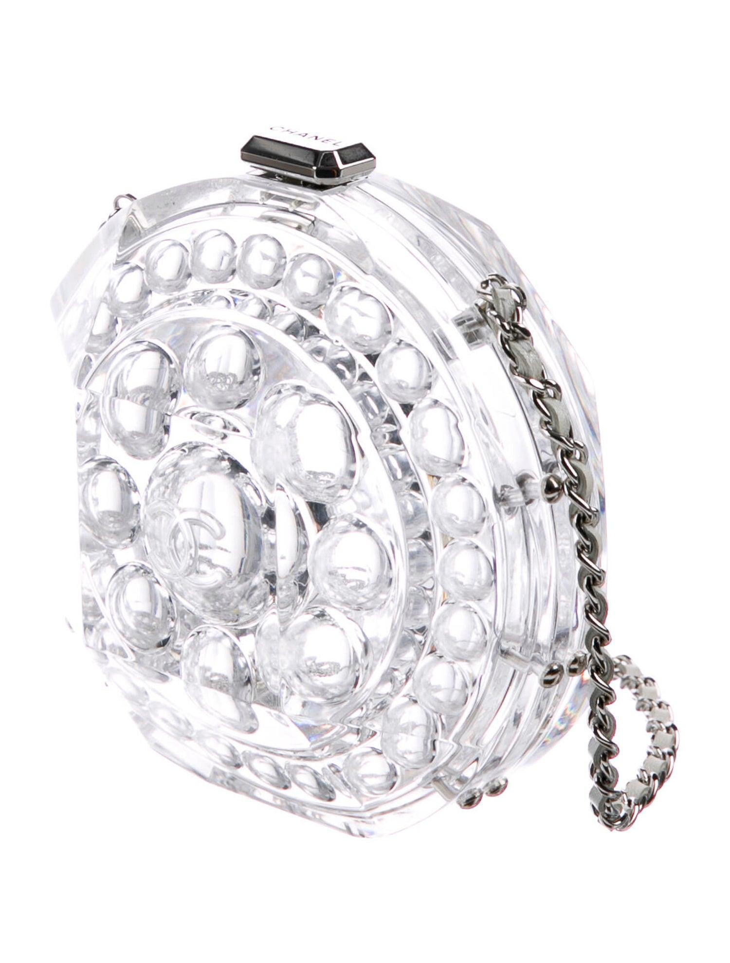 Plexiglass
Crystal
Leather 
Silver-tone hardware
Push-lock closure
Shoulder strap drop 21