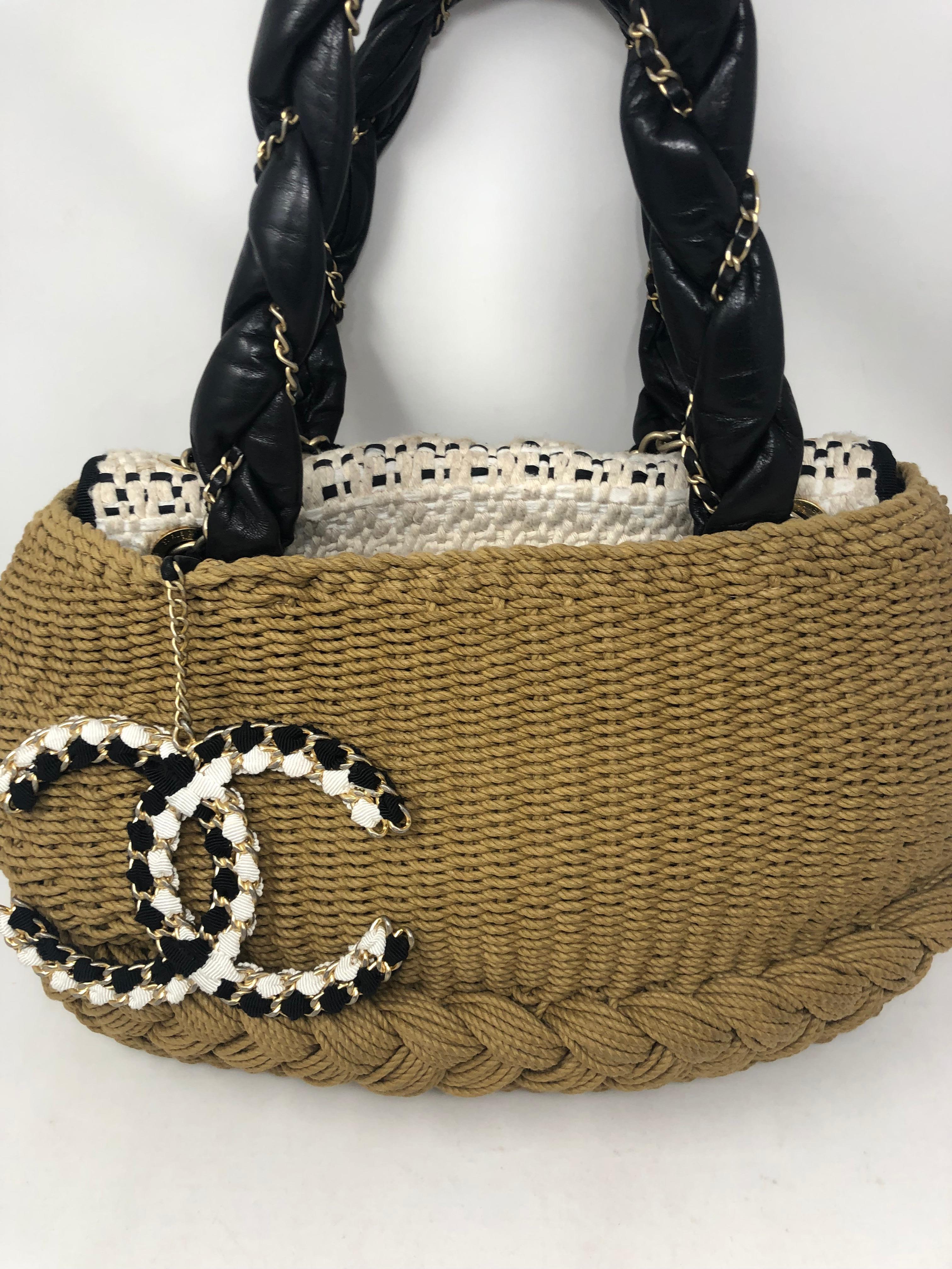 Chanel Runway Wicker Bag with black leather handles. Extra chain straps. Heavy and beautiful bag. Limited and rare piece. Perfect bag for the Hamptons or any resort. Guaranteed authentic. 