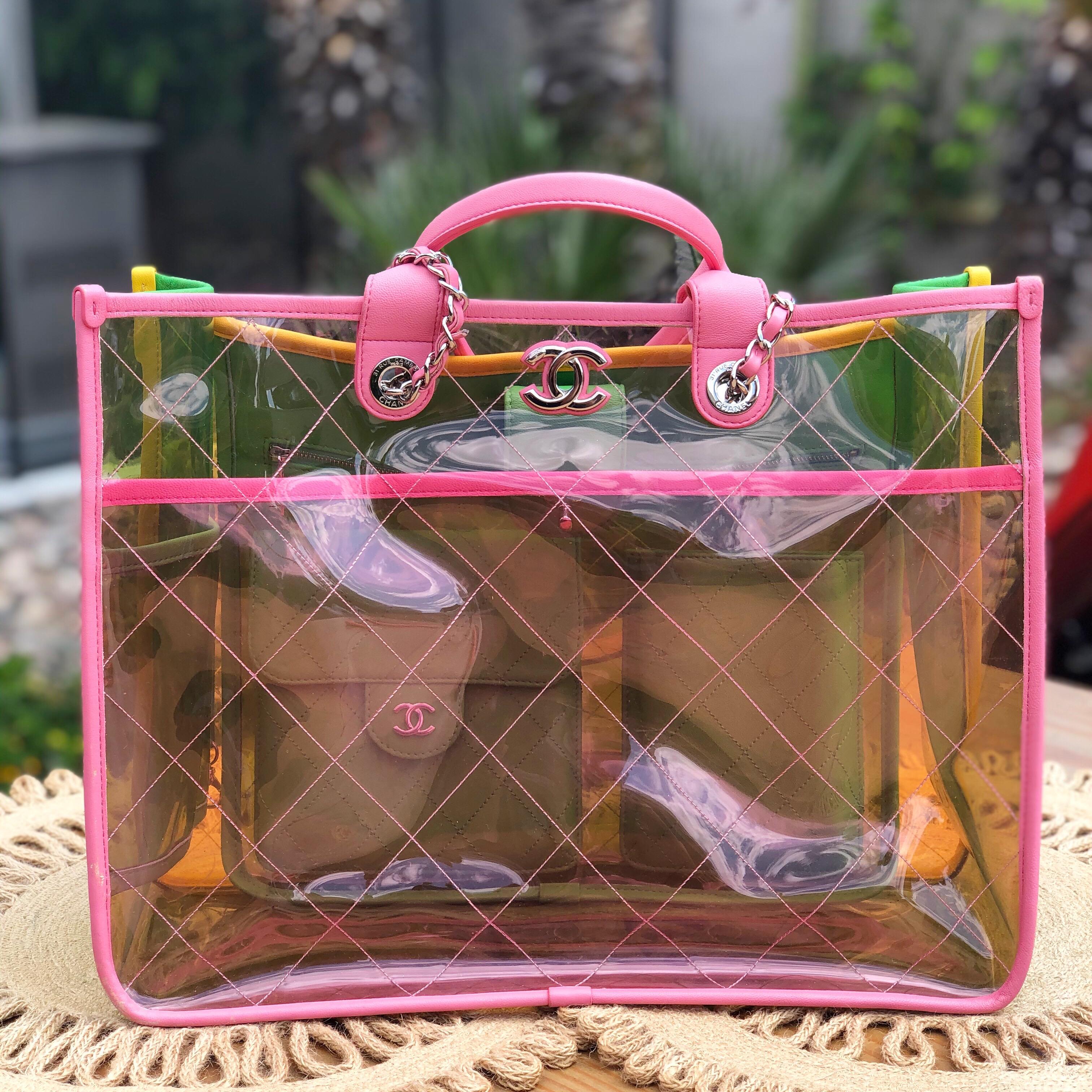 Hello.... Chanel S/S '18 Coco Splash Tote! This lovely Chanel bag is in green and pink diamond stitched transparent multicolored PVC with silver-tone hardware, dual woven chain-link leather shoulder straps with top handles, yellow and pink leather