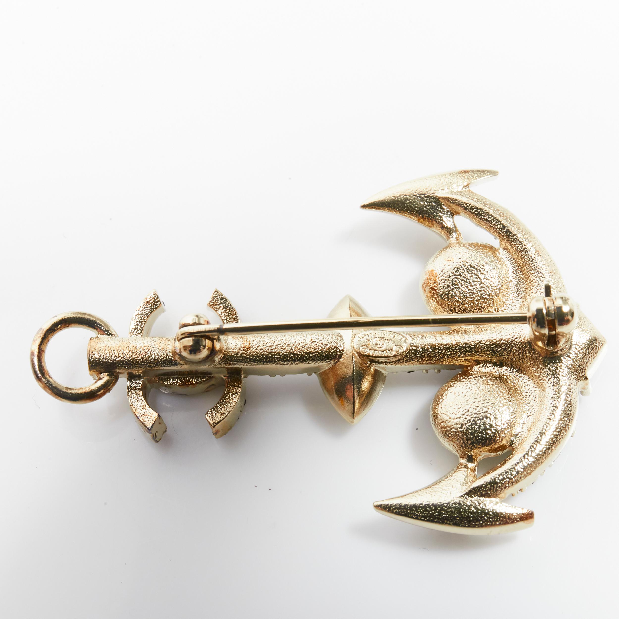 black and gold brooch