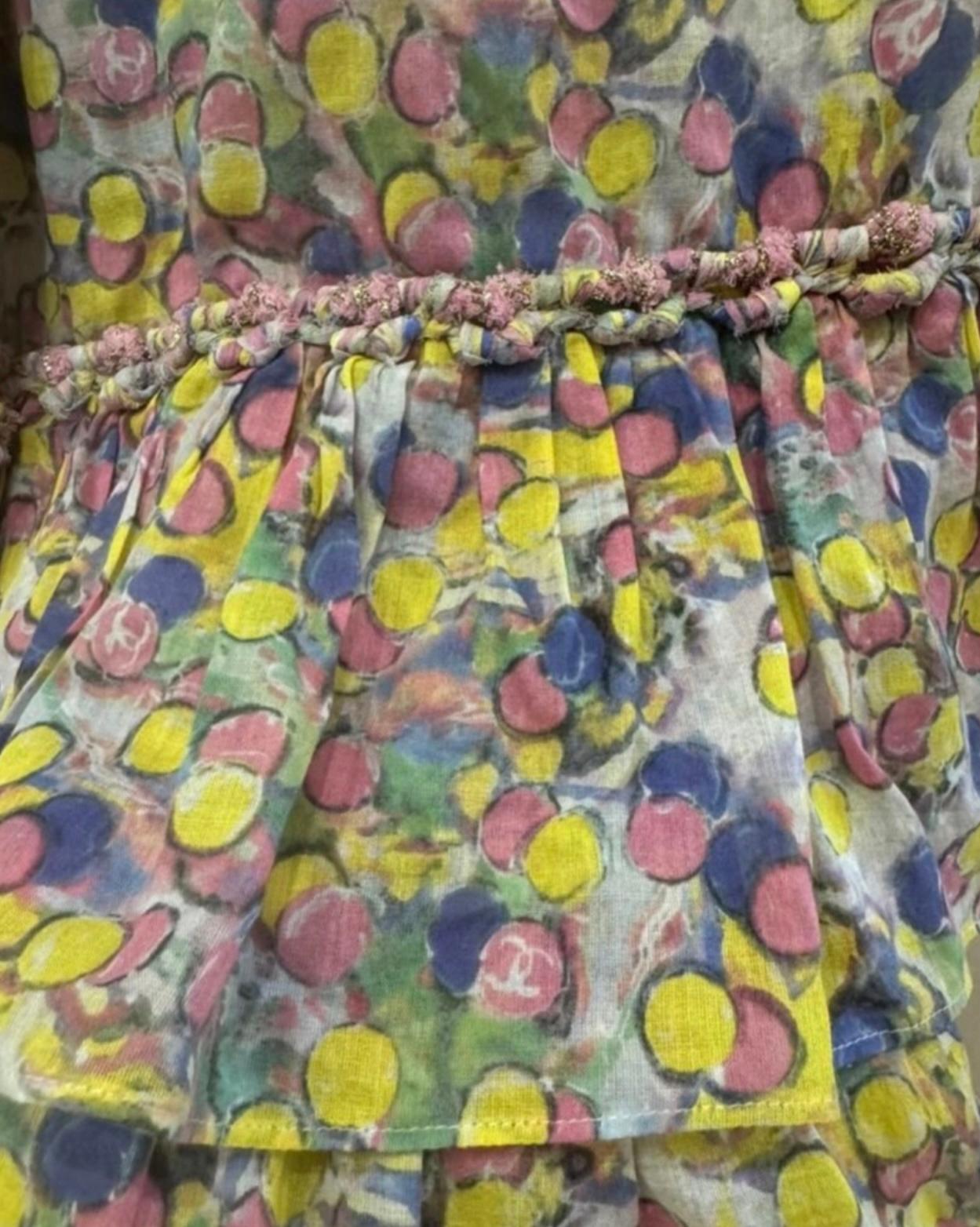Stunning Chanel dress with CC logo pattern from Runway of 2011 Cruise SAINT-TROPEZ Collection
- CC logo buttons at back
Size mark 38 FR. Condition is pristine.