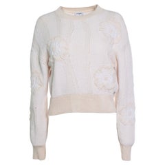 Chanel, salmon coloured knitted camellia sweater