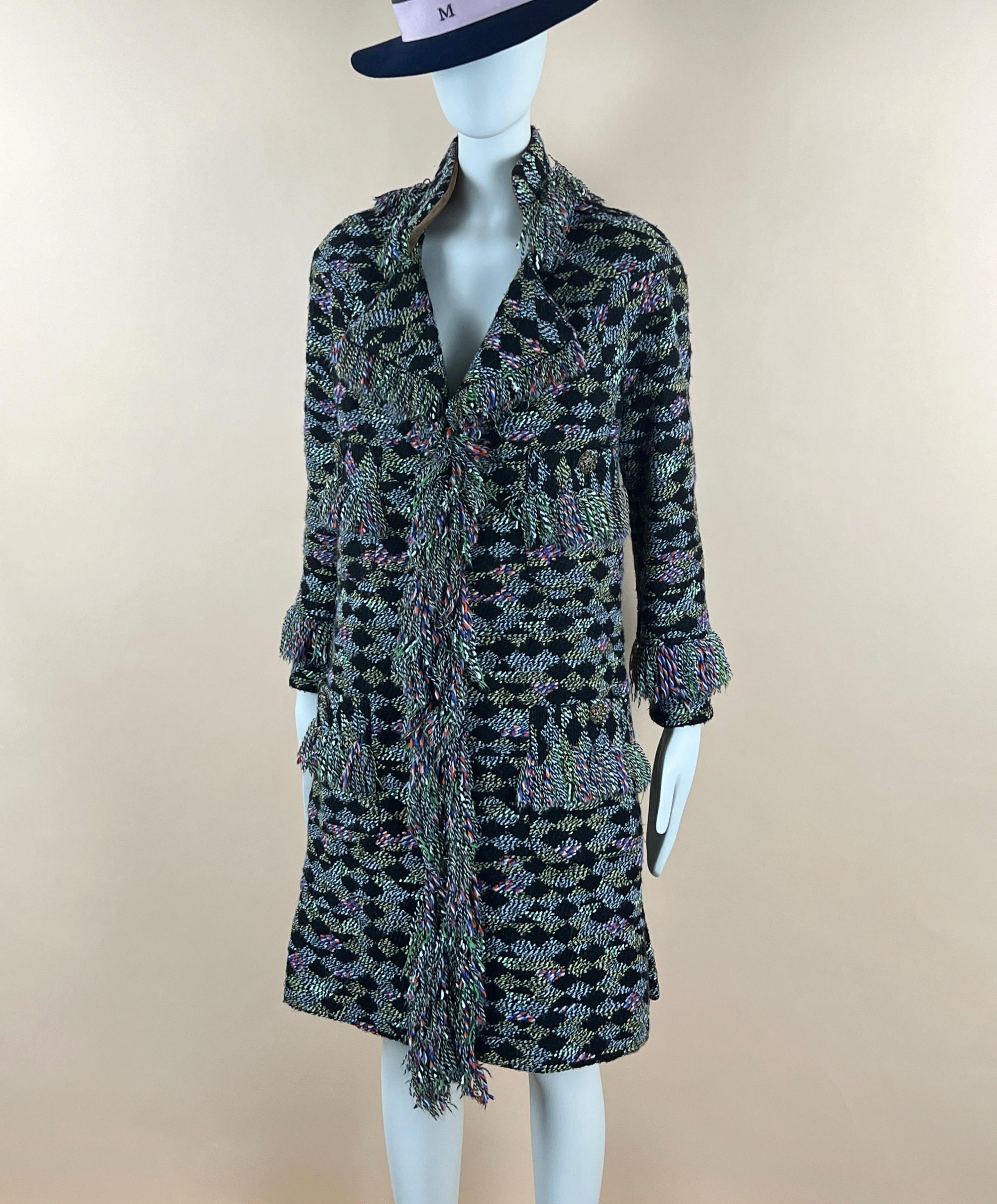 New stunning Chanel tweed coat from Runway of Paris/SALZBURG Metiers d'Art Collection, 2015 Pre-Fall
Retail price ca. 9,000$
- made of fantasy tweed with signature fringe edging
- CC logo Jewel buttons embellished with natural stones and crystals
-