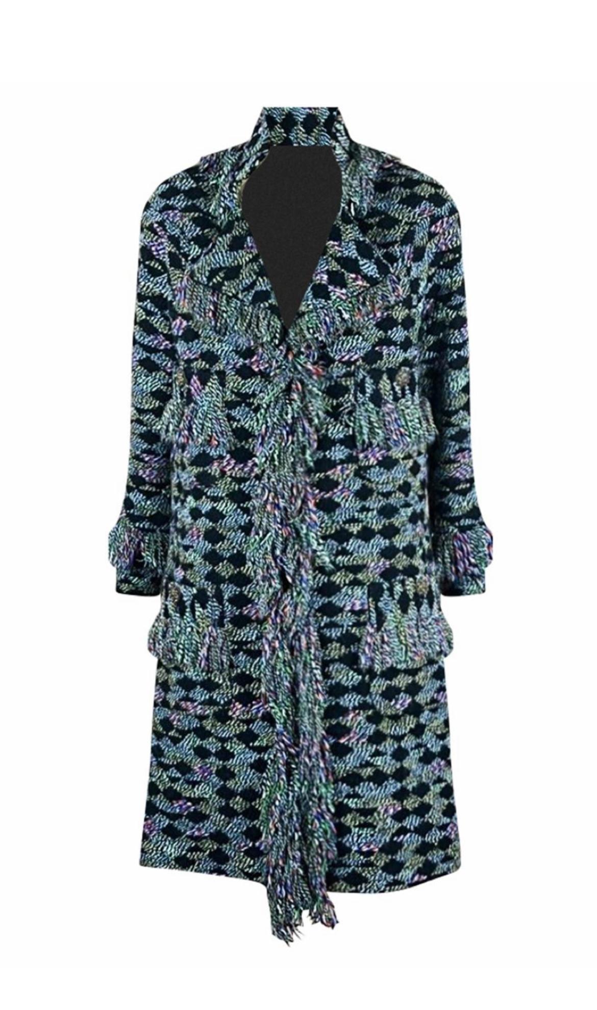 Stunning Chanel tweed coat from Runway of Paris/SALZBURG Metiers d'Art Collection, 2015 Pre-Fall
Retail price ca. 9,000$
- made of fantasy tweed with signature fringe edging
- CC logo Jewel buttons embellished with natural stones and crystals
-