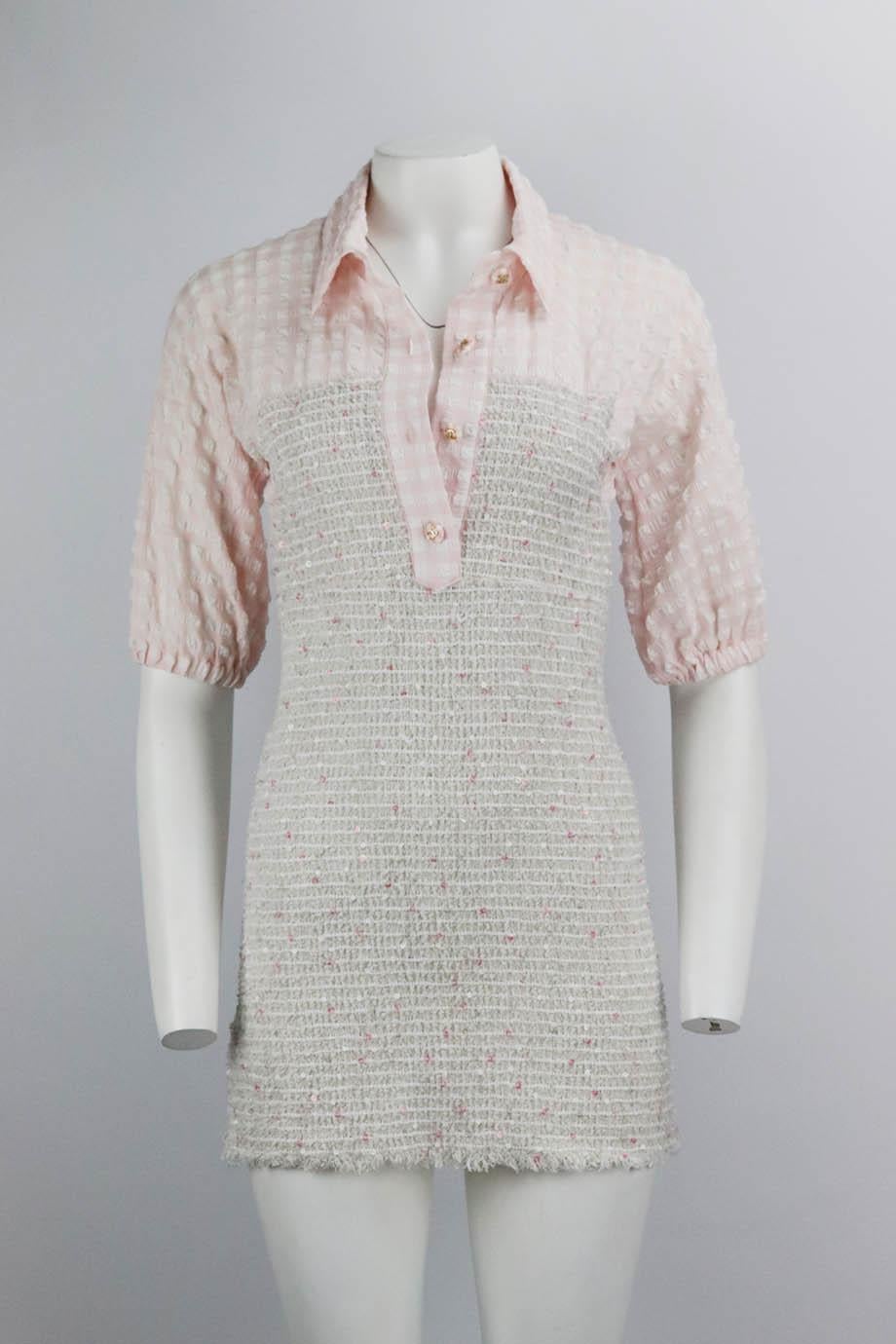 Chanel sample cotton blend tweed mini dress. Pink and white. Short sleeve, v-neck. Zip fastening at back. 38% Polyamide, 30% cotton, 21% polyester, 10% wool, 1% acetate. Size: FR 38 (UK 10, US 6, IT 42). Bust: 31 in. Waist: 26 in. Hips: 33 in.