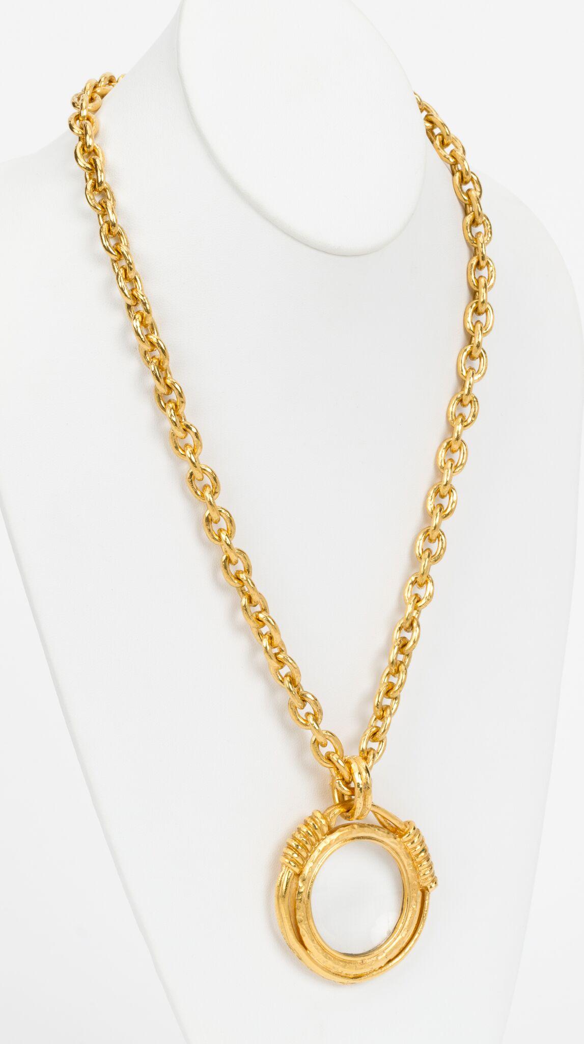 Chanel satin gold long chain magnifier necklace. 80s collection. Mint condition. Comes with original box.
